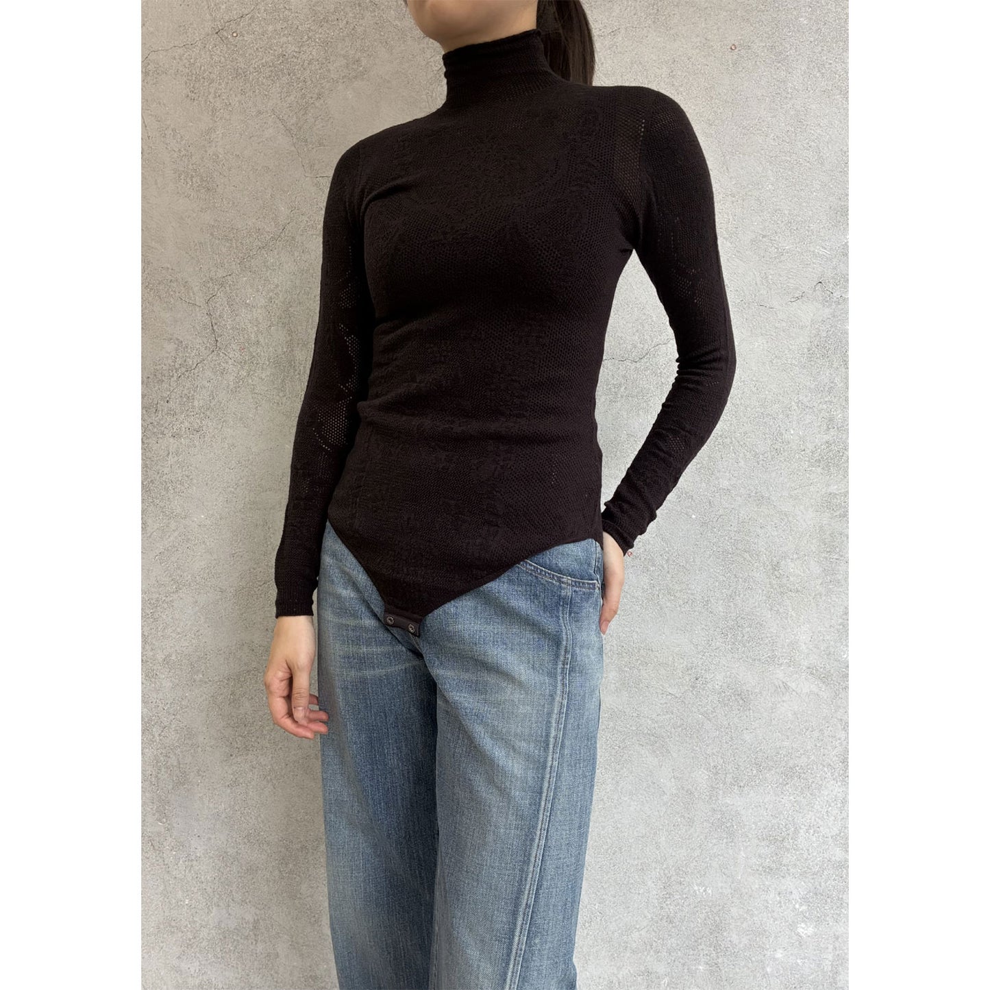 
                  
                    WOOL LACE KNIT TURTLENECK BODYSUIT
                  
                