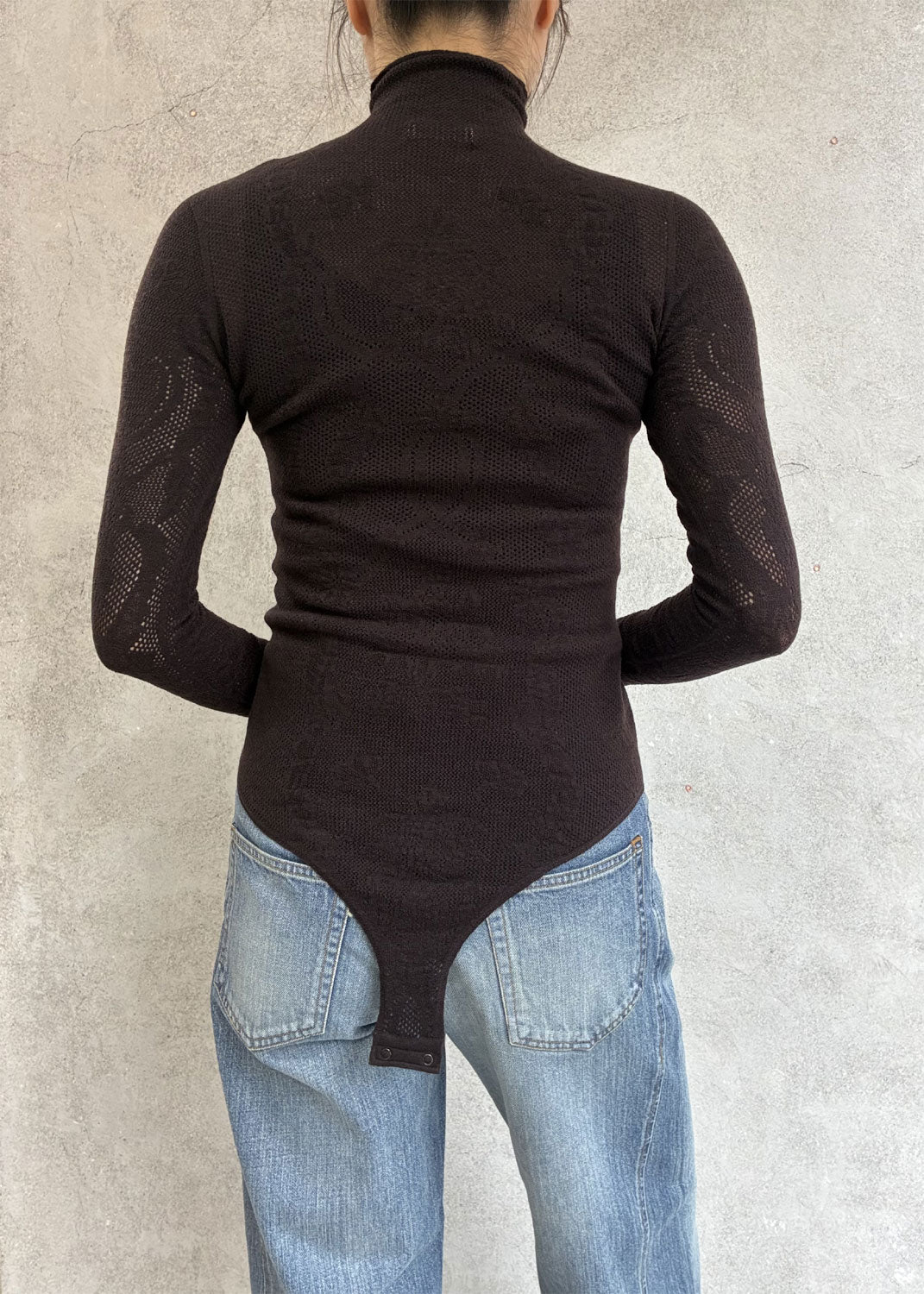 
                  
                    WOOL LACE KNIT TURTLENECK BODYSUIT
                  
                