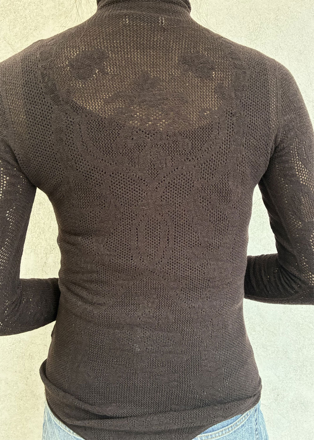 
                  
                    WOOL LACE KNIT TURTLENECK BODYSUIT
                  
                
