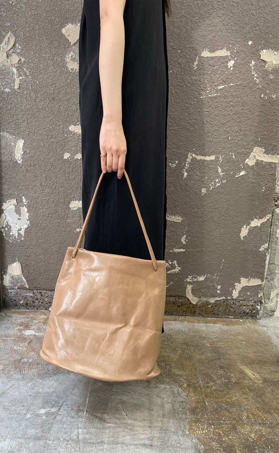 
                  
                    LEATHER HOOF BAG
                  
                