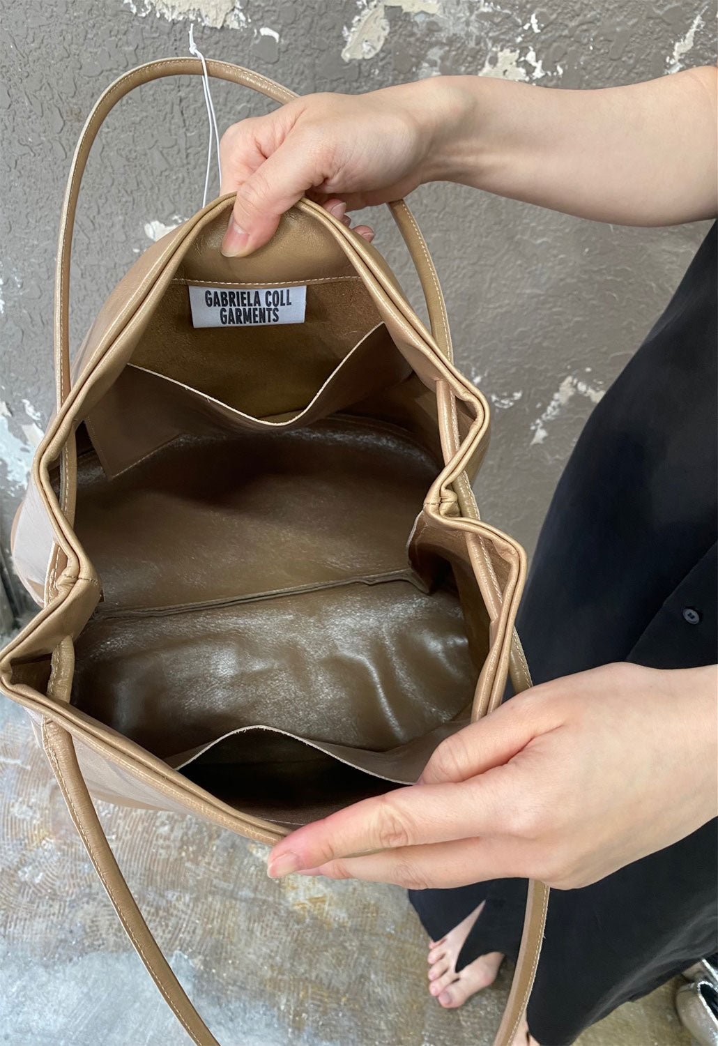 
                  
                    LEATHER HOOF BAG
                  
                