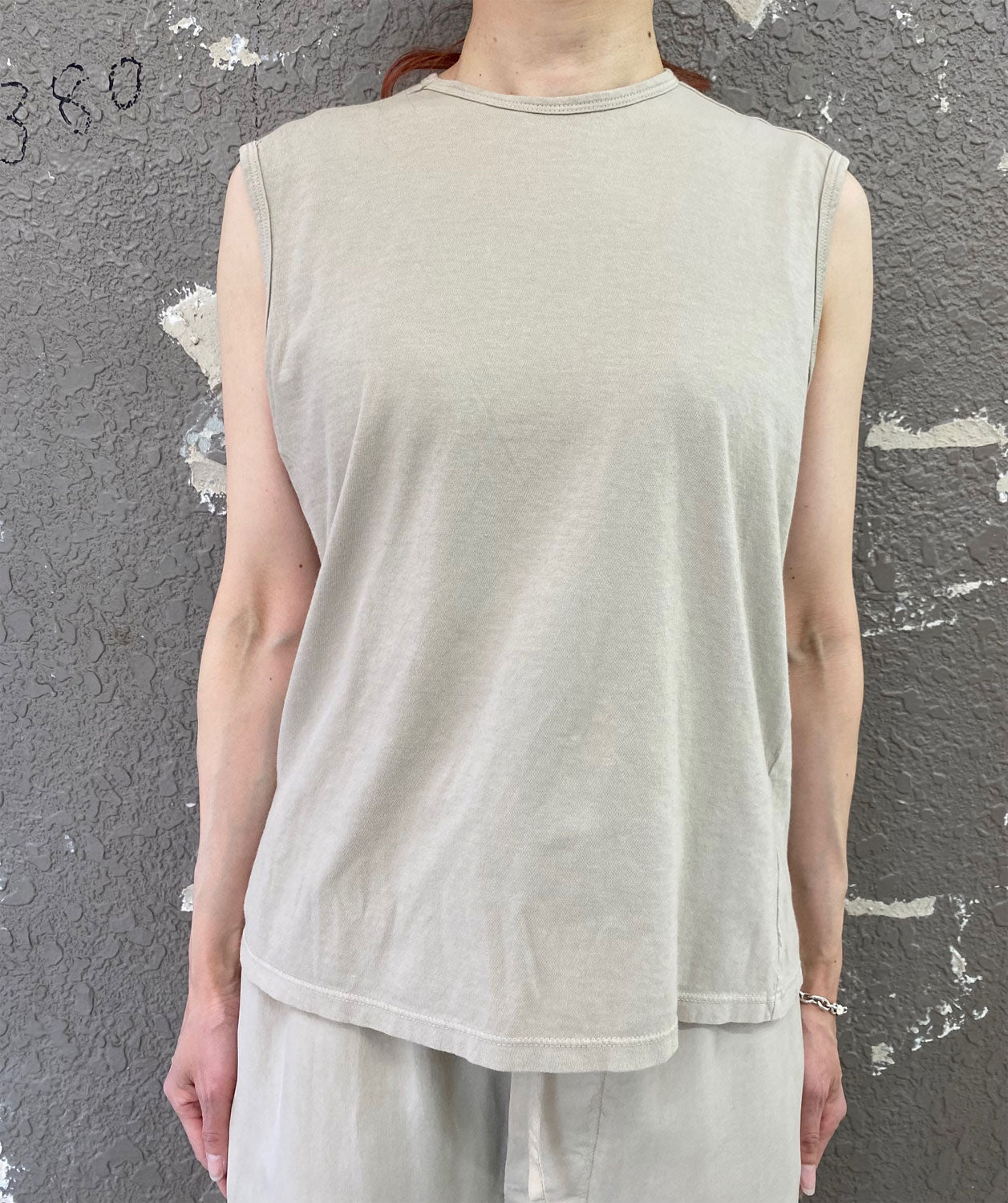 
                  
                    ORGANIC COTTON SLEEVELESS T-SHIRT
                  
                