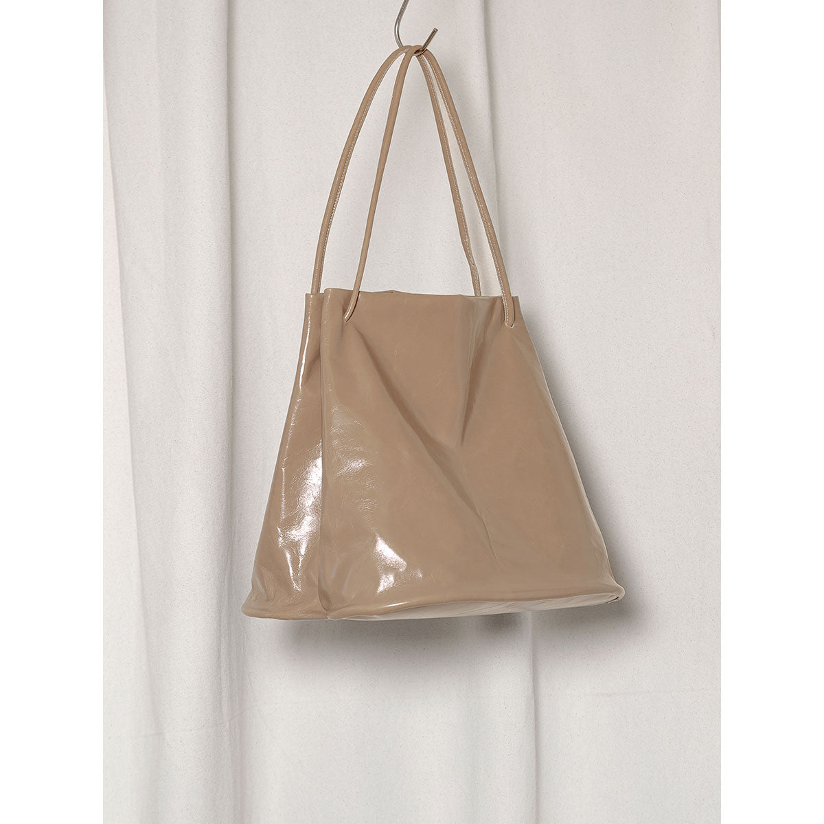 
                  
                    LEATHER HOOF BAG
                  
                