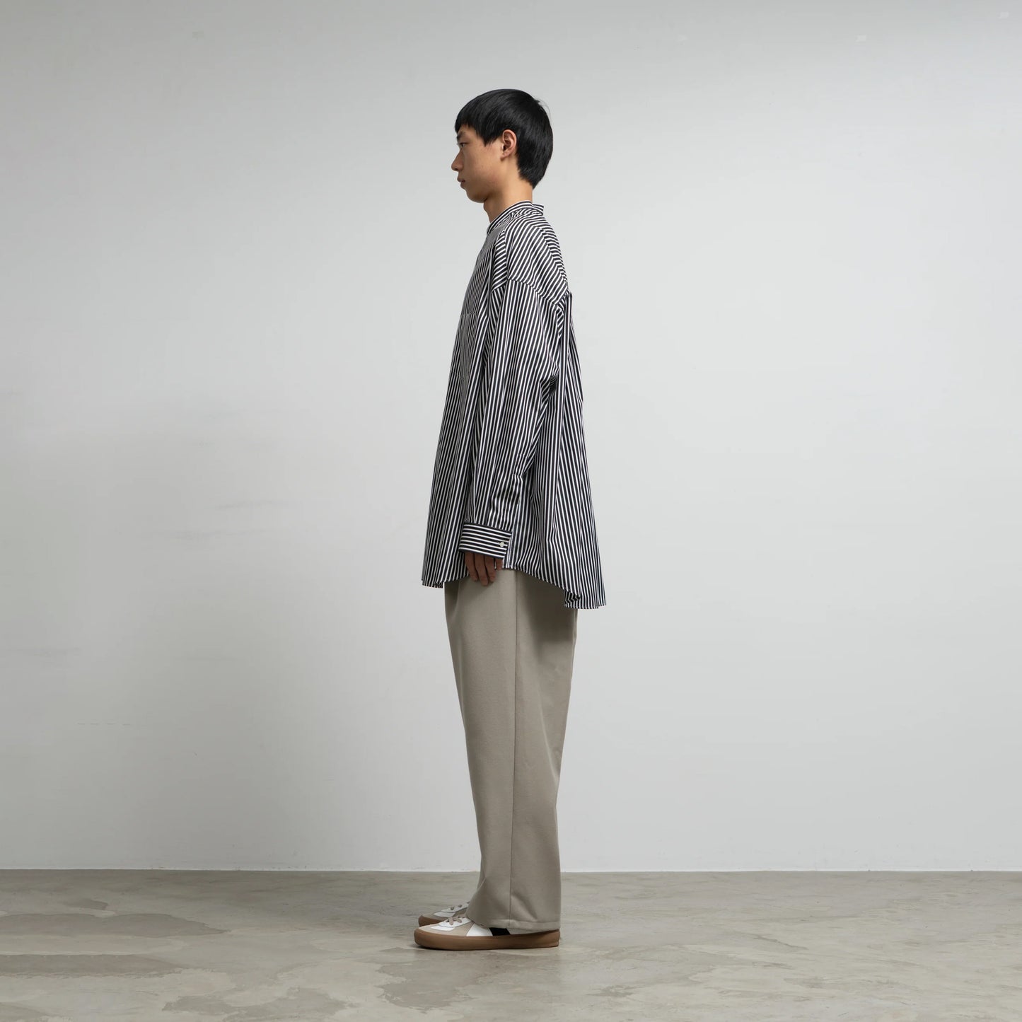 
                  
                    HIGH COUNT BAND COLLAR ROUND CUT OVERSIZED SHIRT
                  
                