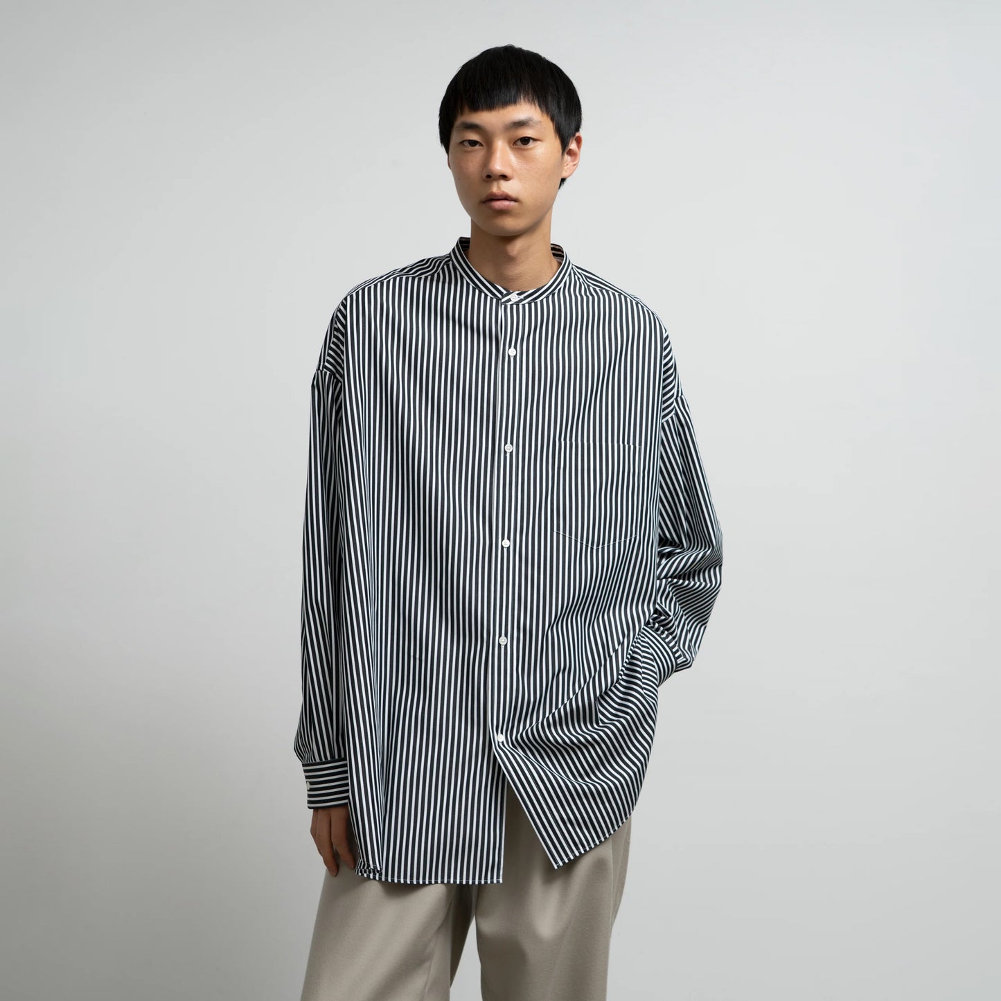 
                  
                    HIGH COUNT BAND COLLAR ROUND CUT OVERSIZED SHIRT
                  
                