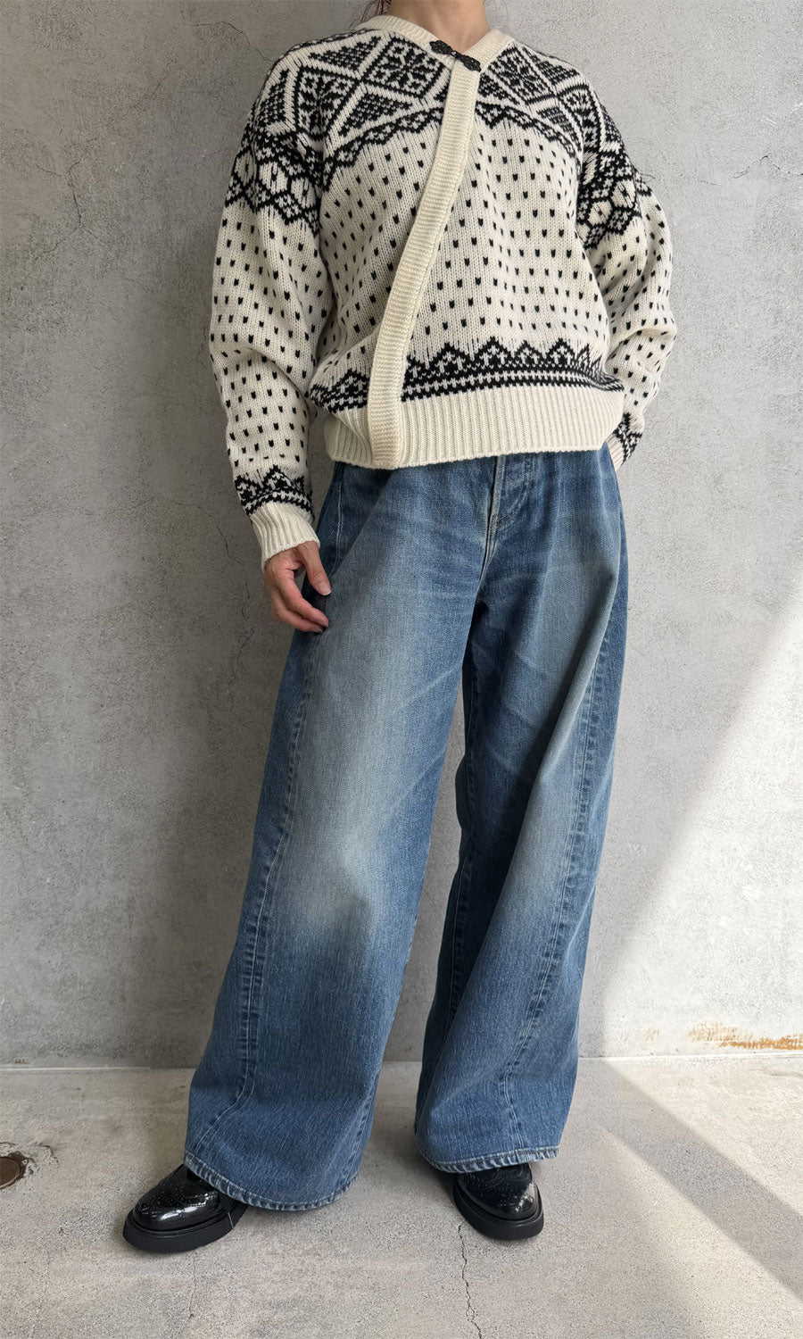 
                  
                    NORDIC WRAP SWEATER
                  
                