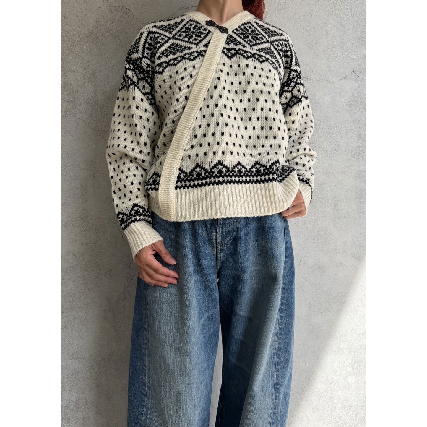 
                  
                    NORDIC WRAP SWEATER
                  
                