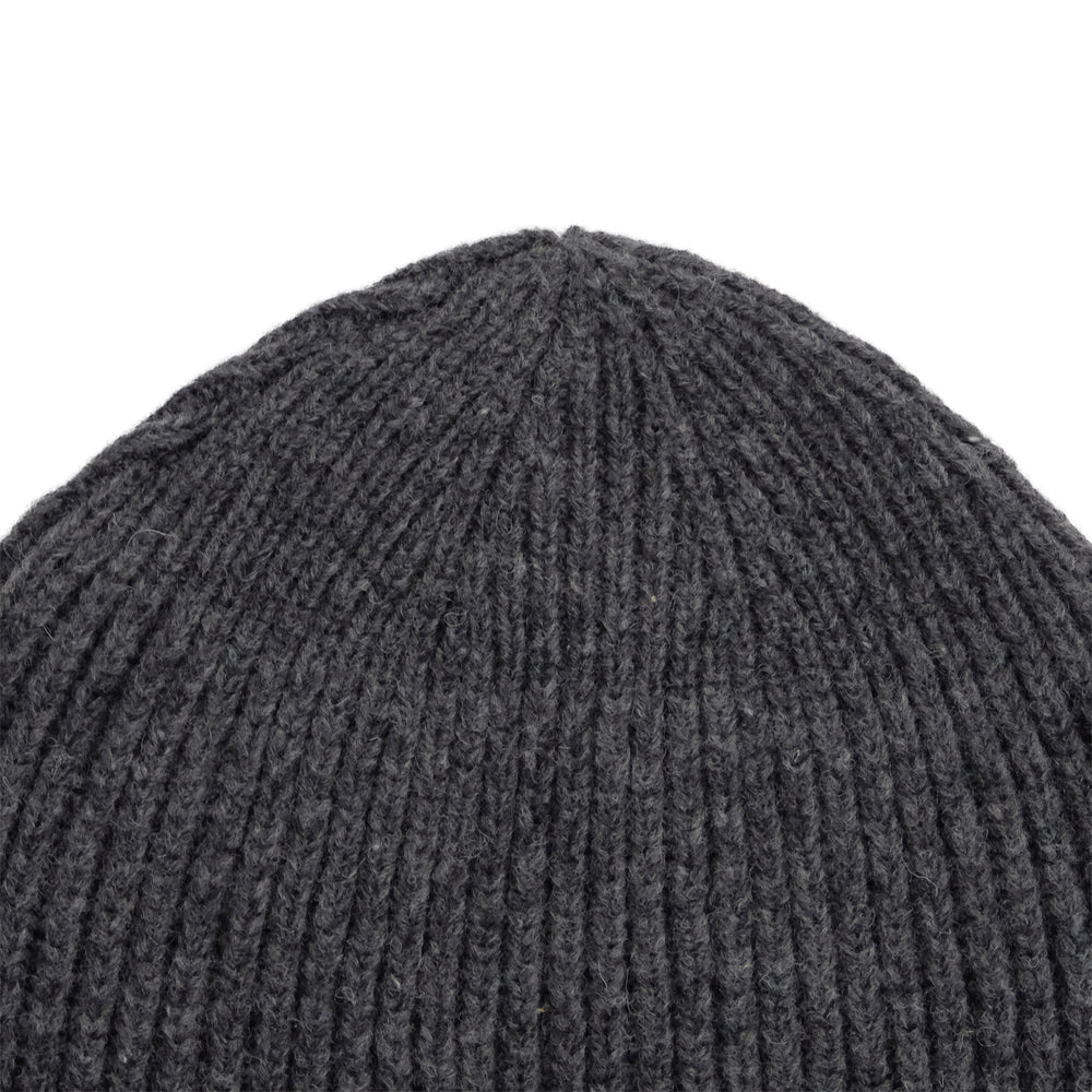 
                  
                    RIBBED KNIT WOOL BEANIE
                  
                