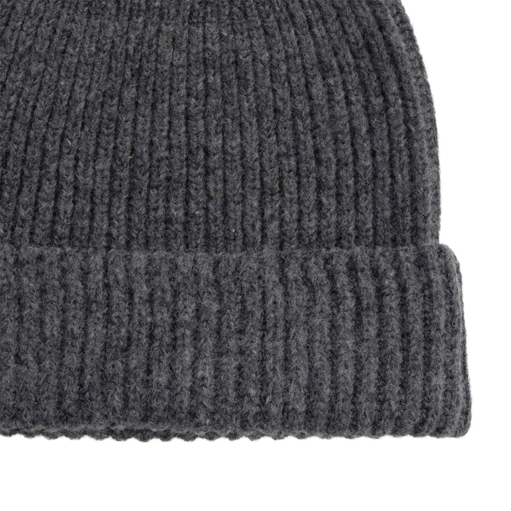 
                  
                    RIBBED KNIT WOOL BEANIE
                  
                