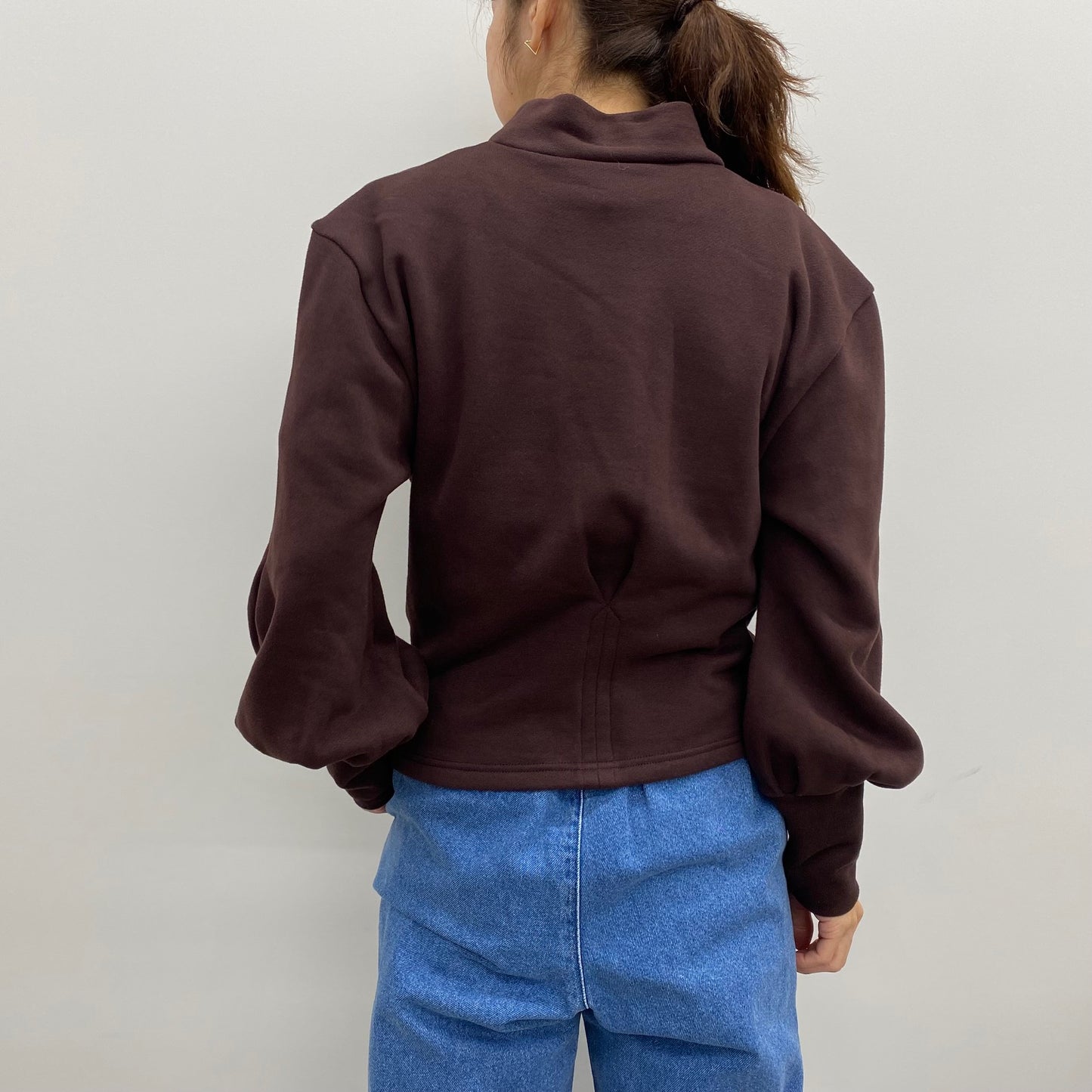 
                  
                    MOANA TUCK DETAIL TOP
                  
                