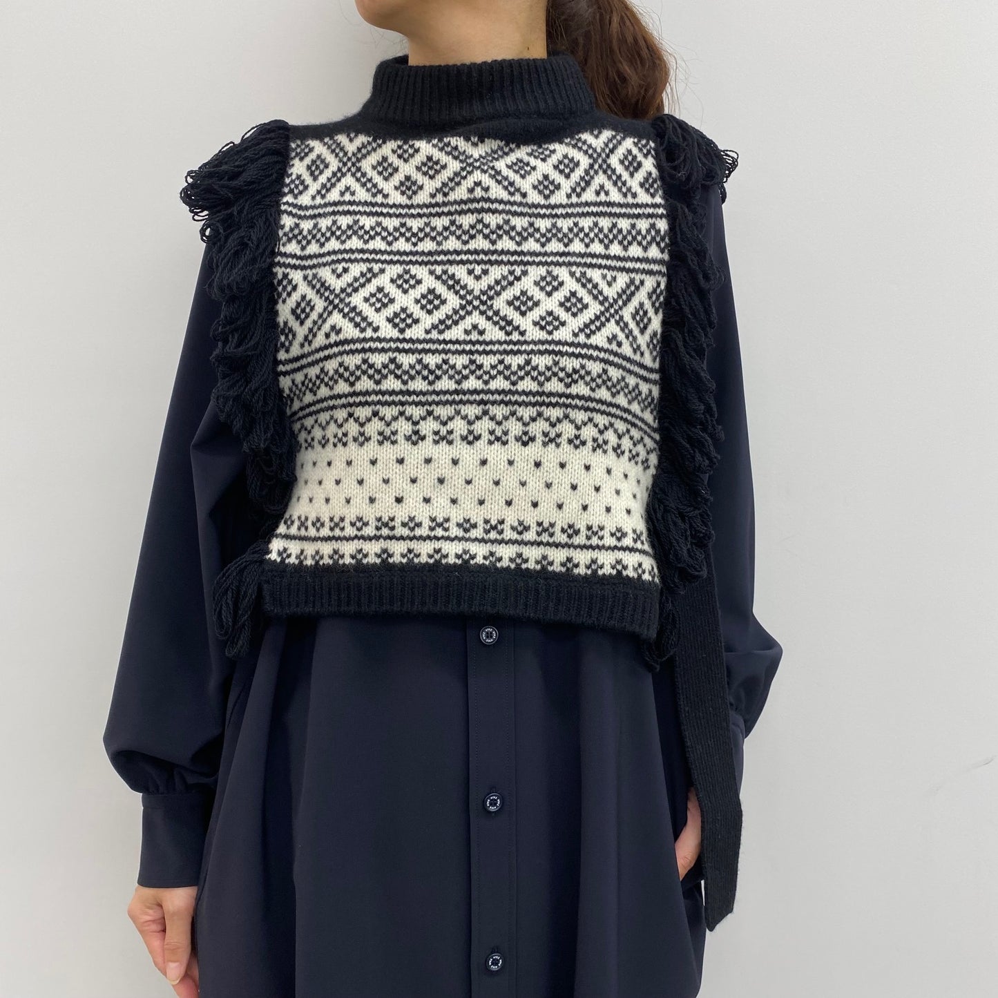 
                  
                    NORDIC FRINGE SWEATER VEST
                  
                