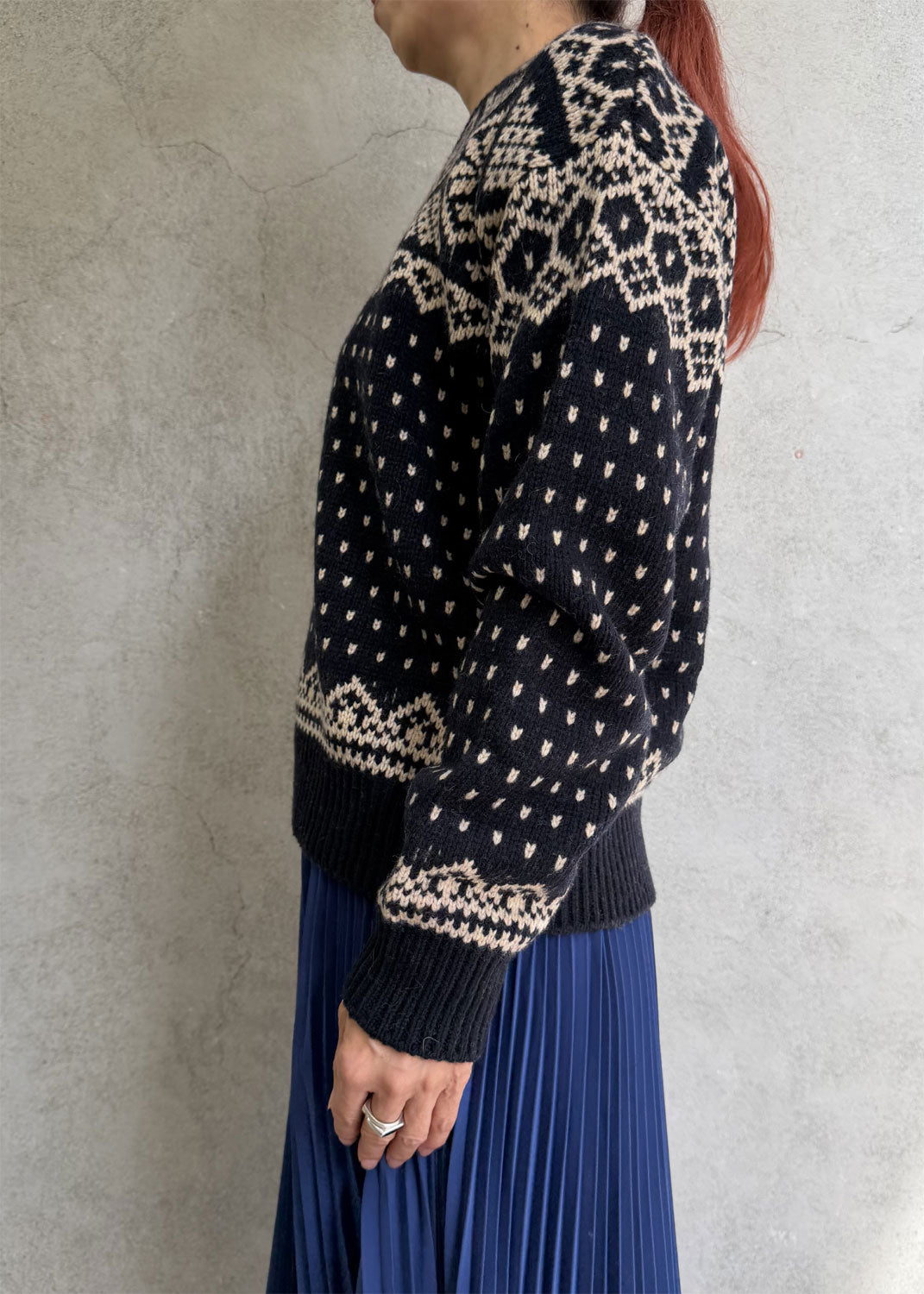 
                  
                    NORDIC WRAP SWEATER
                  
                