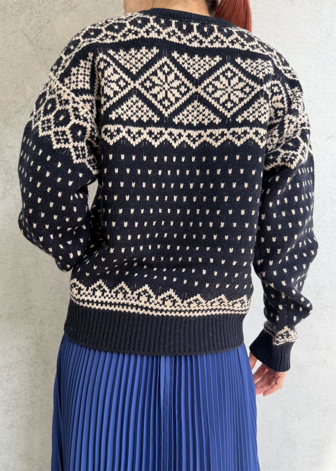 
                  
                    NORDIC WRAP SWEATER
                  
                