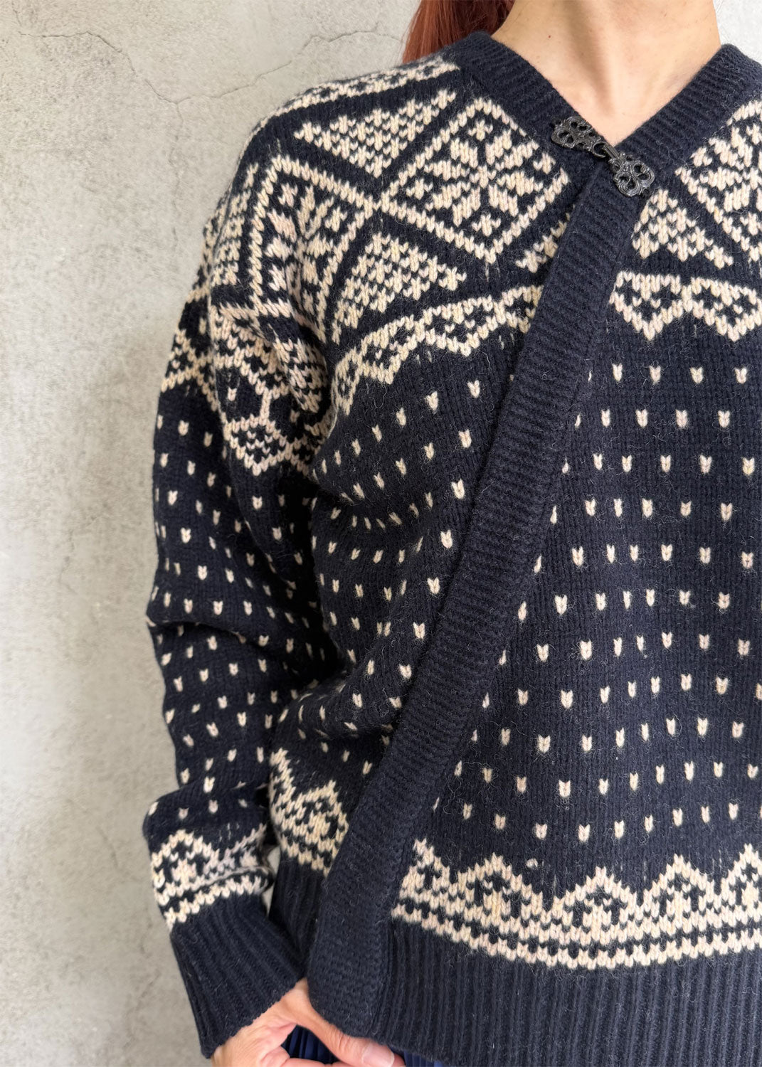 
                  
                    NORDIC WRAP SWEATER
                  
                