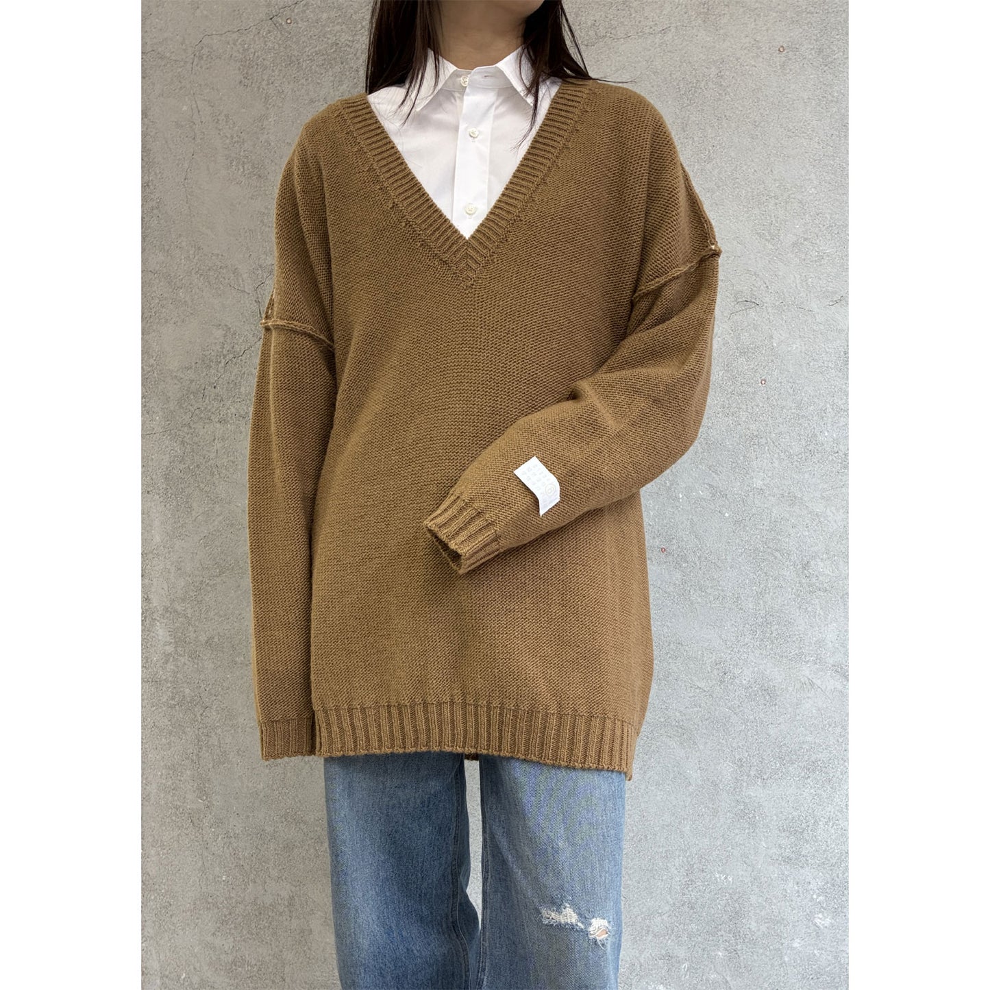 
                  
                    Oversized V-neck Sweater
                  
                
