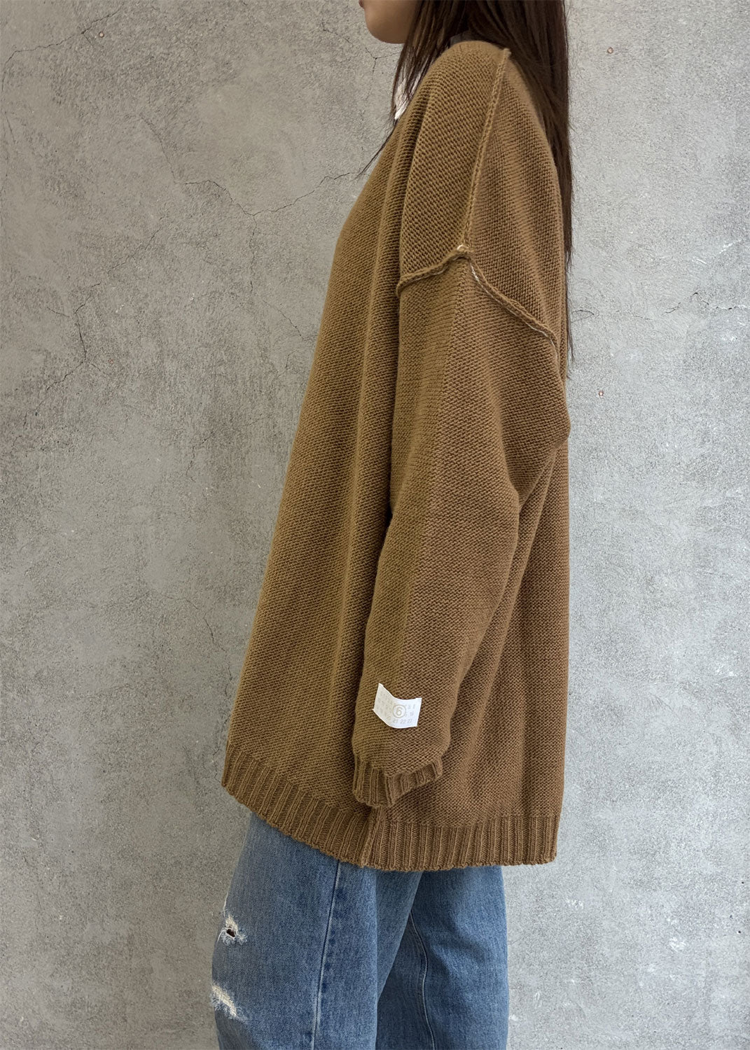 
                  
                    Oversized V-neck Sweater
                  
                