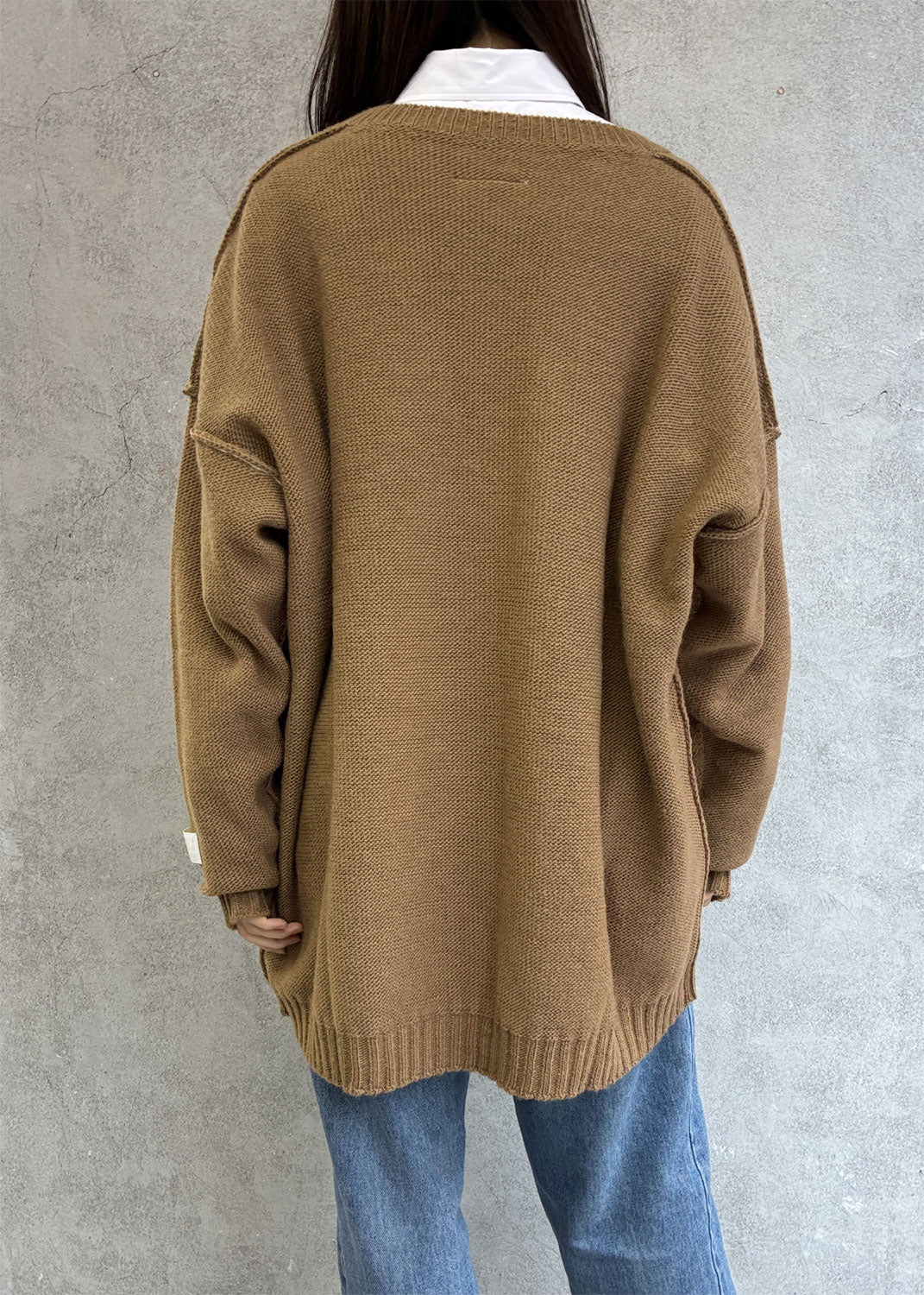 
                  
                    Oversized V-neck Sweater
                  
                