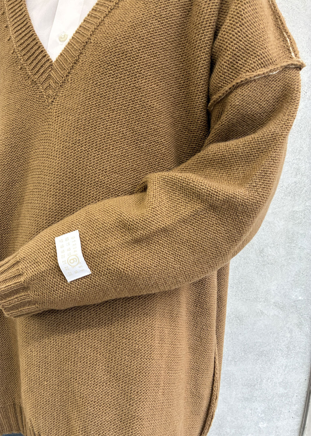 
                  
                    Oversized V-neck Sweater
                  
                