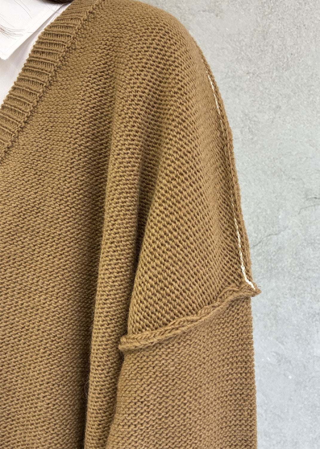 
                  
                    Oversized V-neck Sweater
                  
                