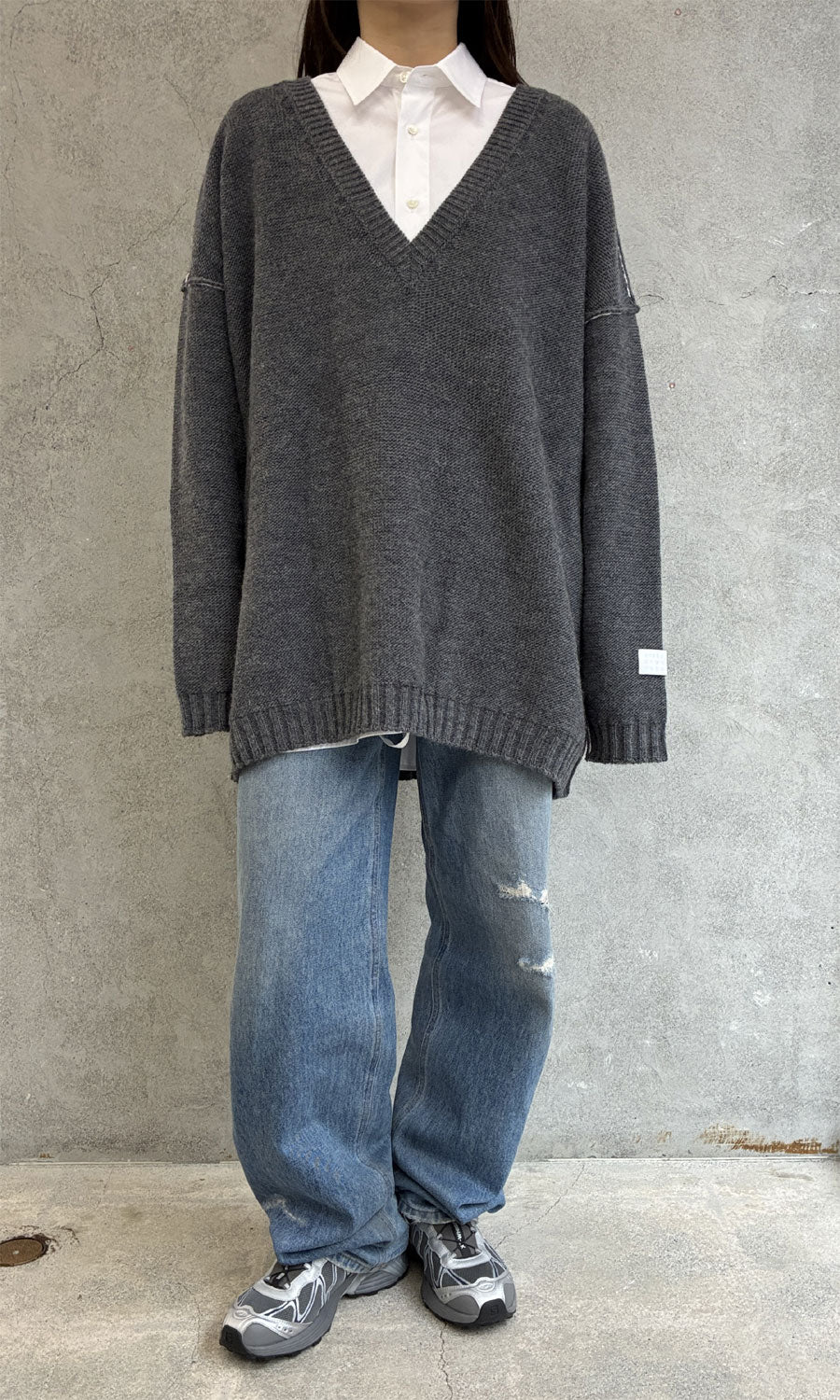 
                  
                    Oversized V-neck Sweater
                  
                