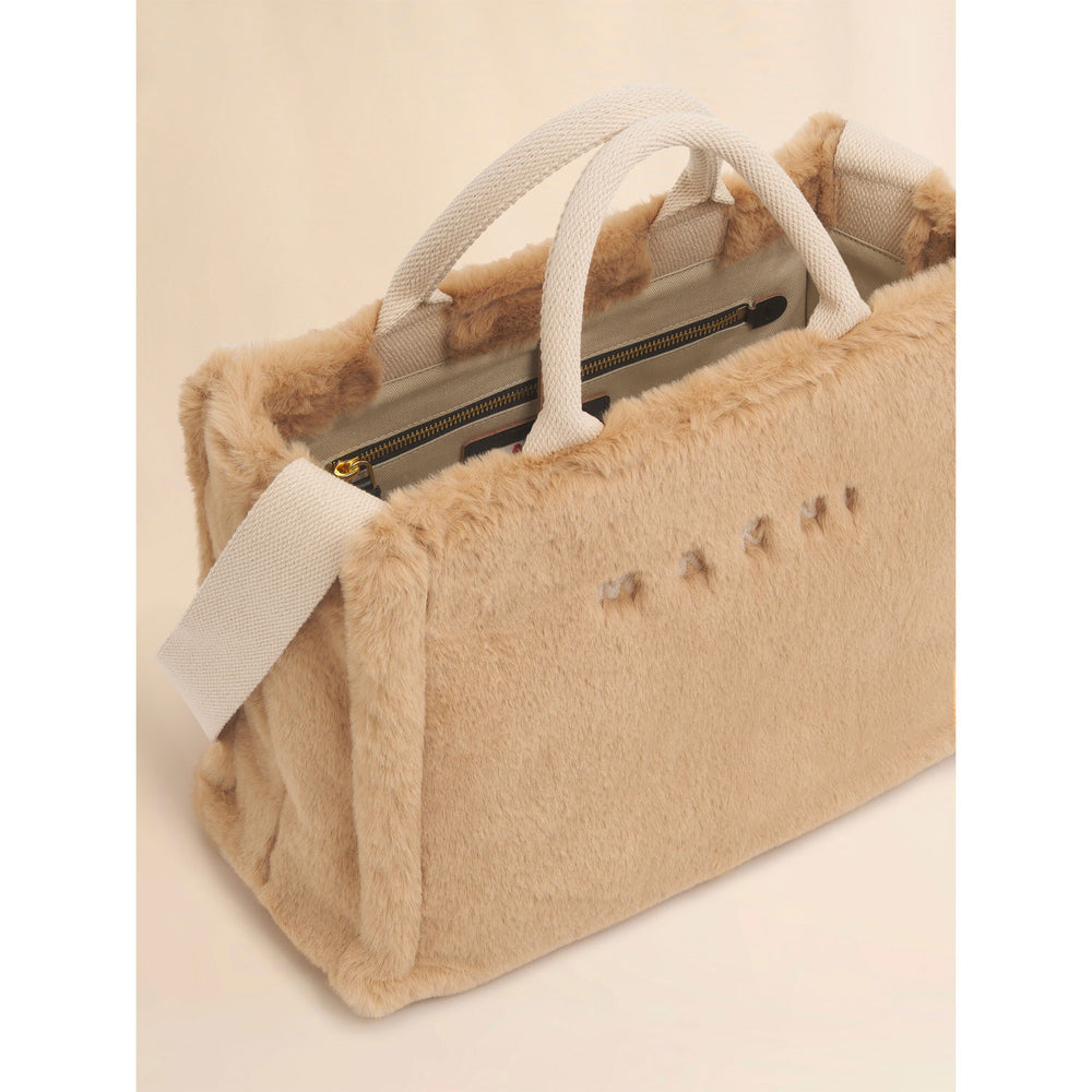 
                  
                    Beige faux fur basket shopper
                  
                