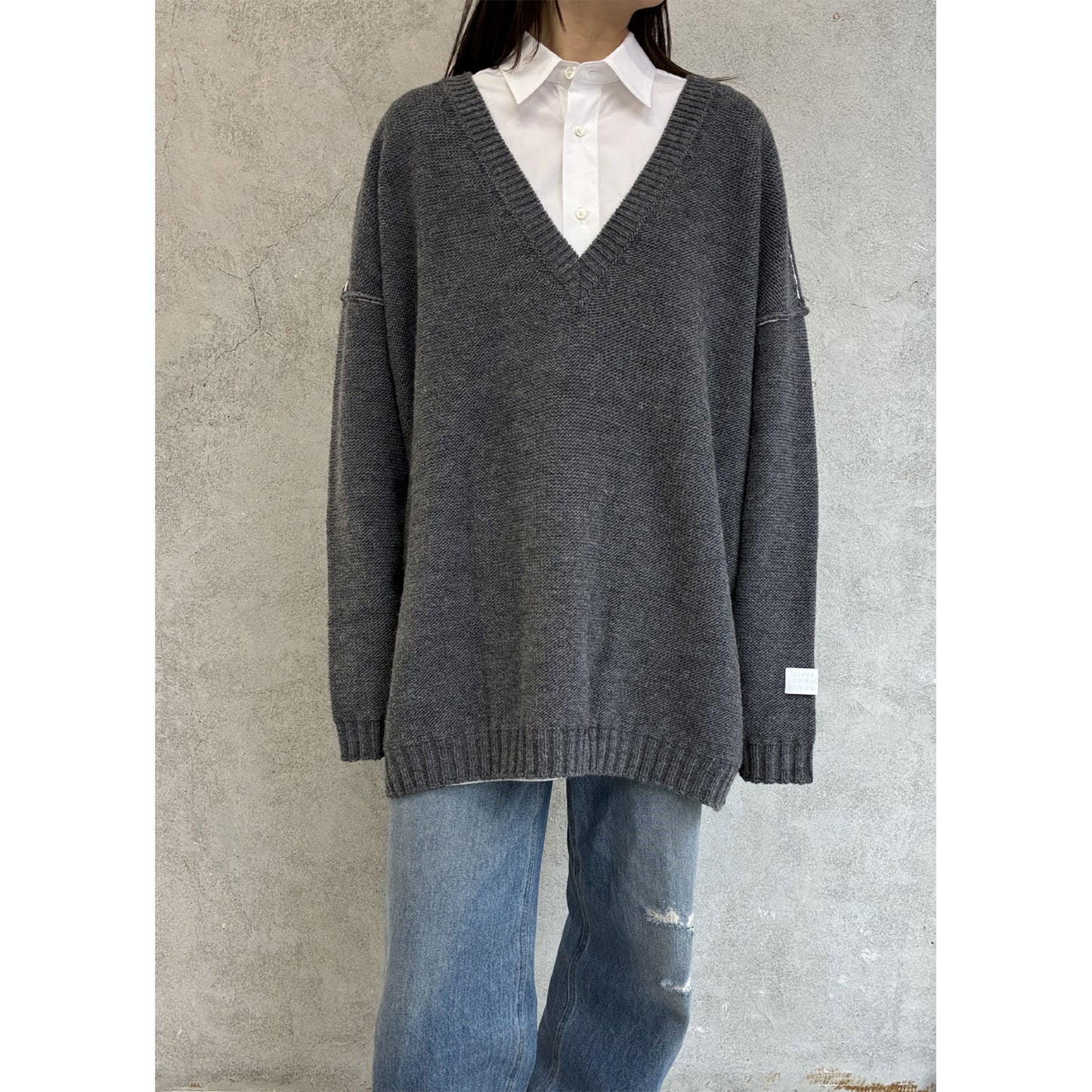 
                  
                    Oversized V-neck Sweater
                  
                