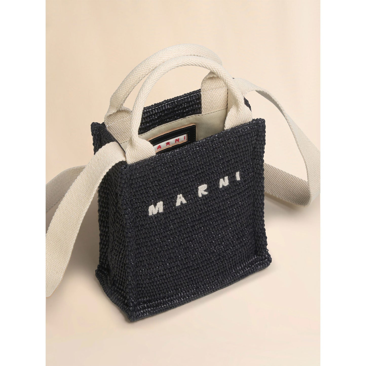 
                  
                    Black raffia effect mini tote bag
                  
                