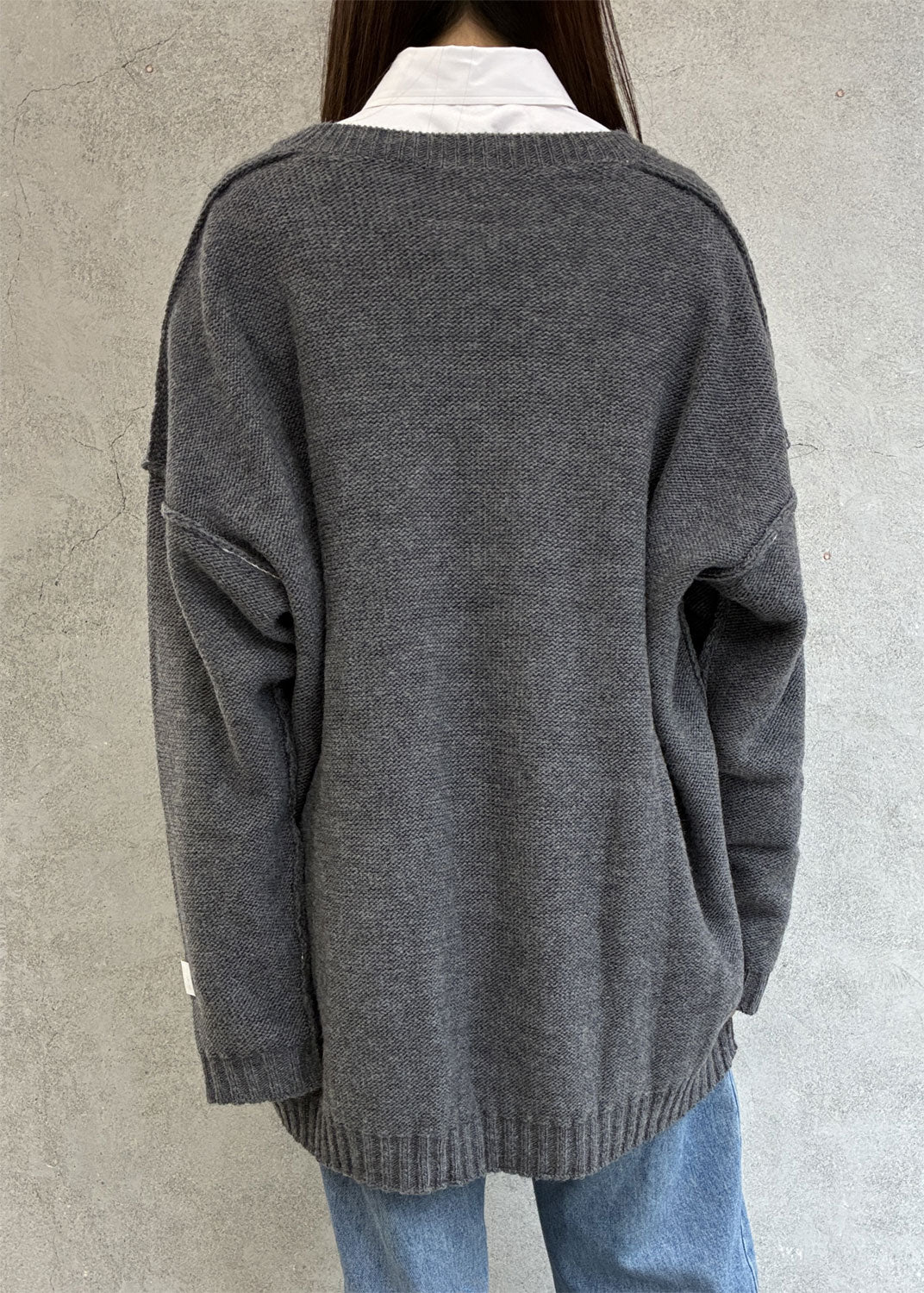
                  
                    Oversized V-neck Sweater
                  
                