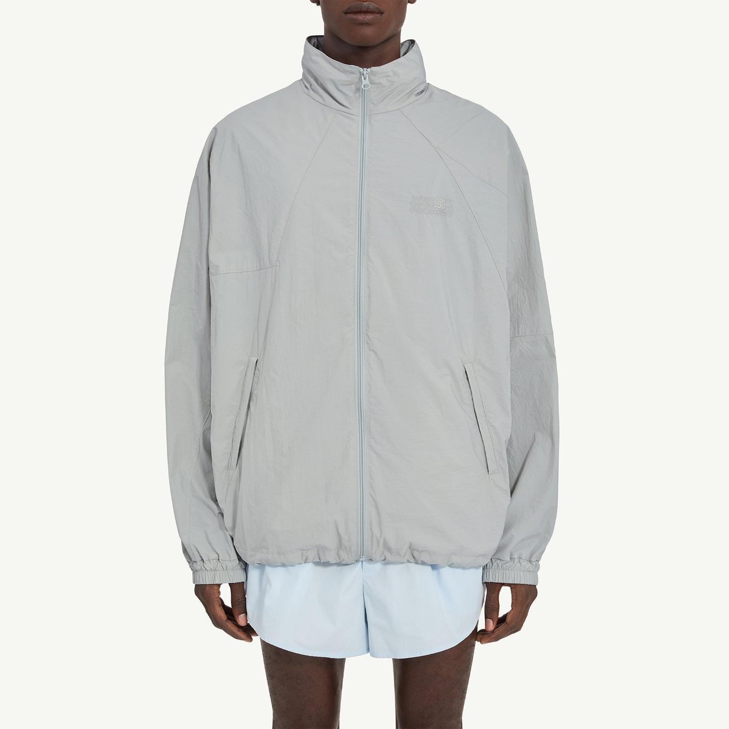 
                  
                    NYLON WINDBREAKER JACKET
                  
                