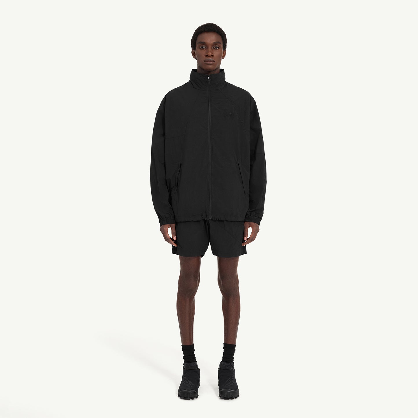 
                  
                    NYLON WINDBREAKER JACKET
                  
                
