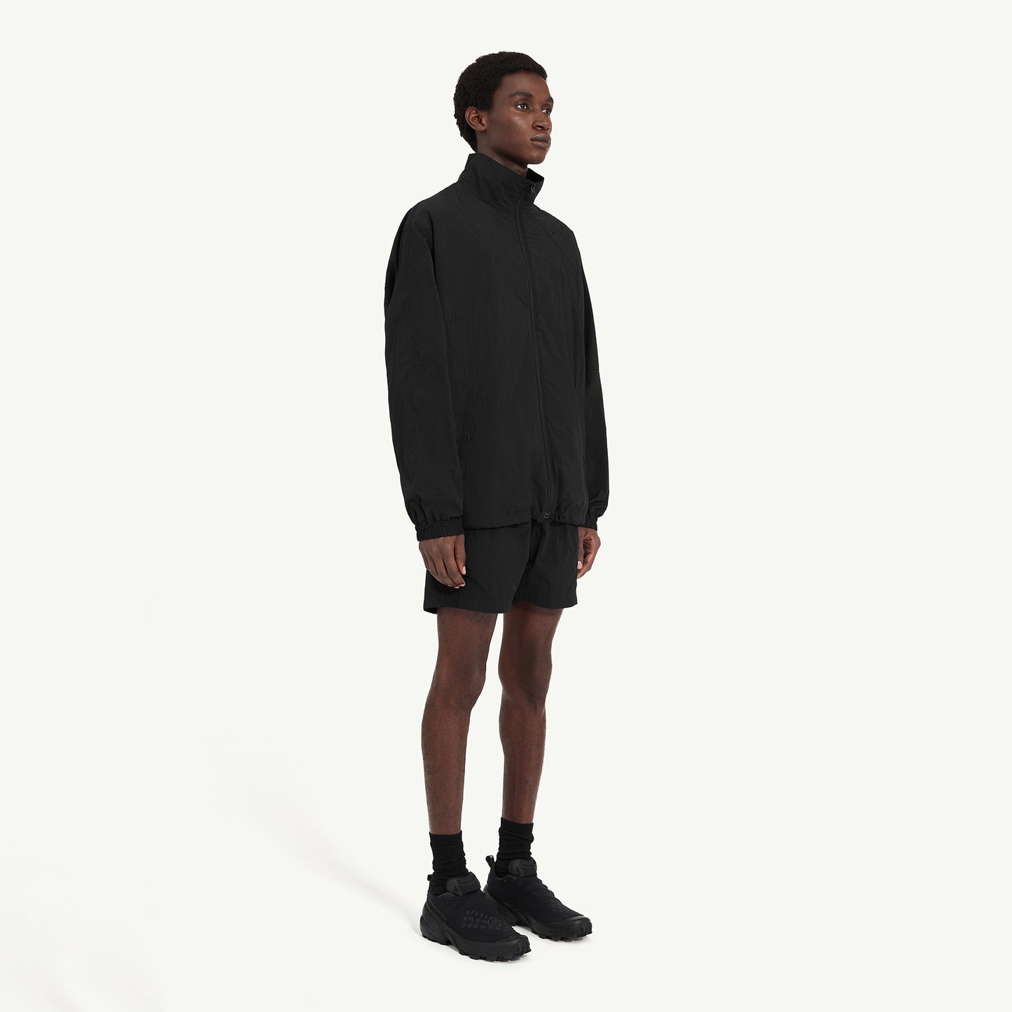
                  
                    NYLON WINDBREAKER JACKET
                  
                