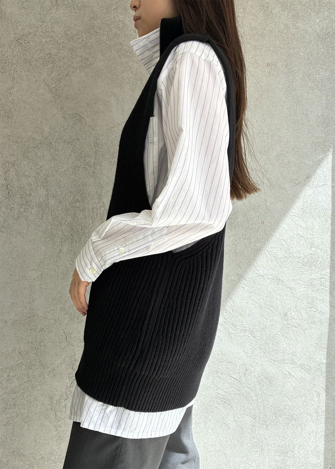 
                  
                    Zip-up knit vest
                  
                
