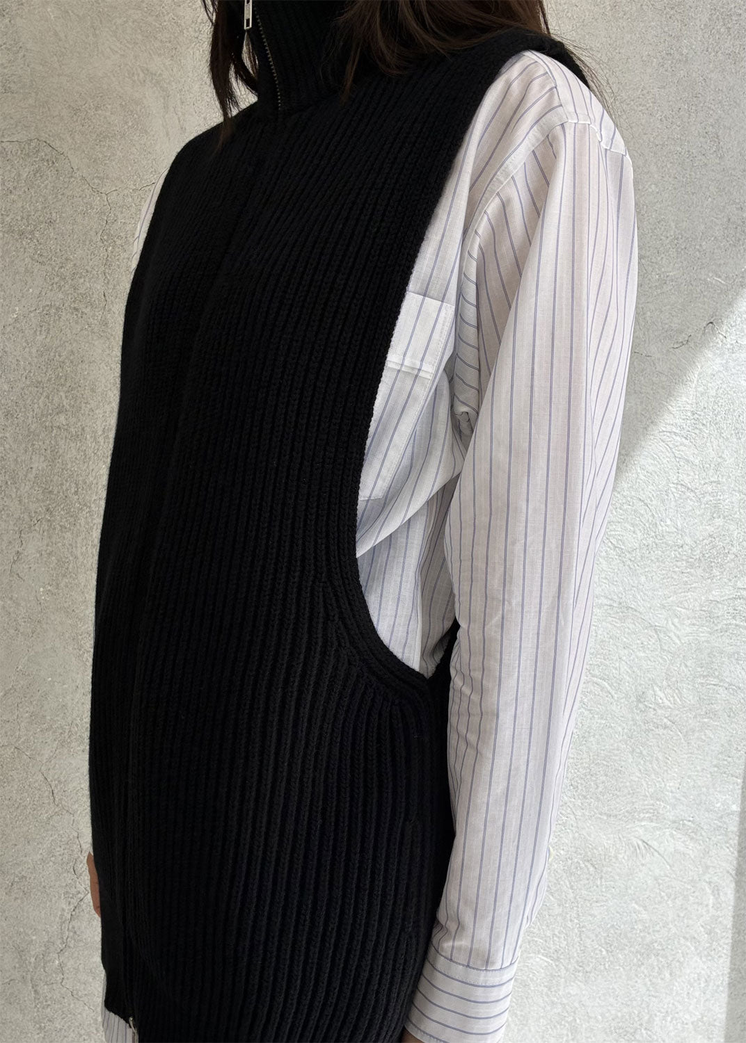 
                  
                    Zip-up knit vest
                  
                
