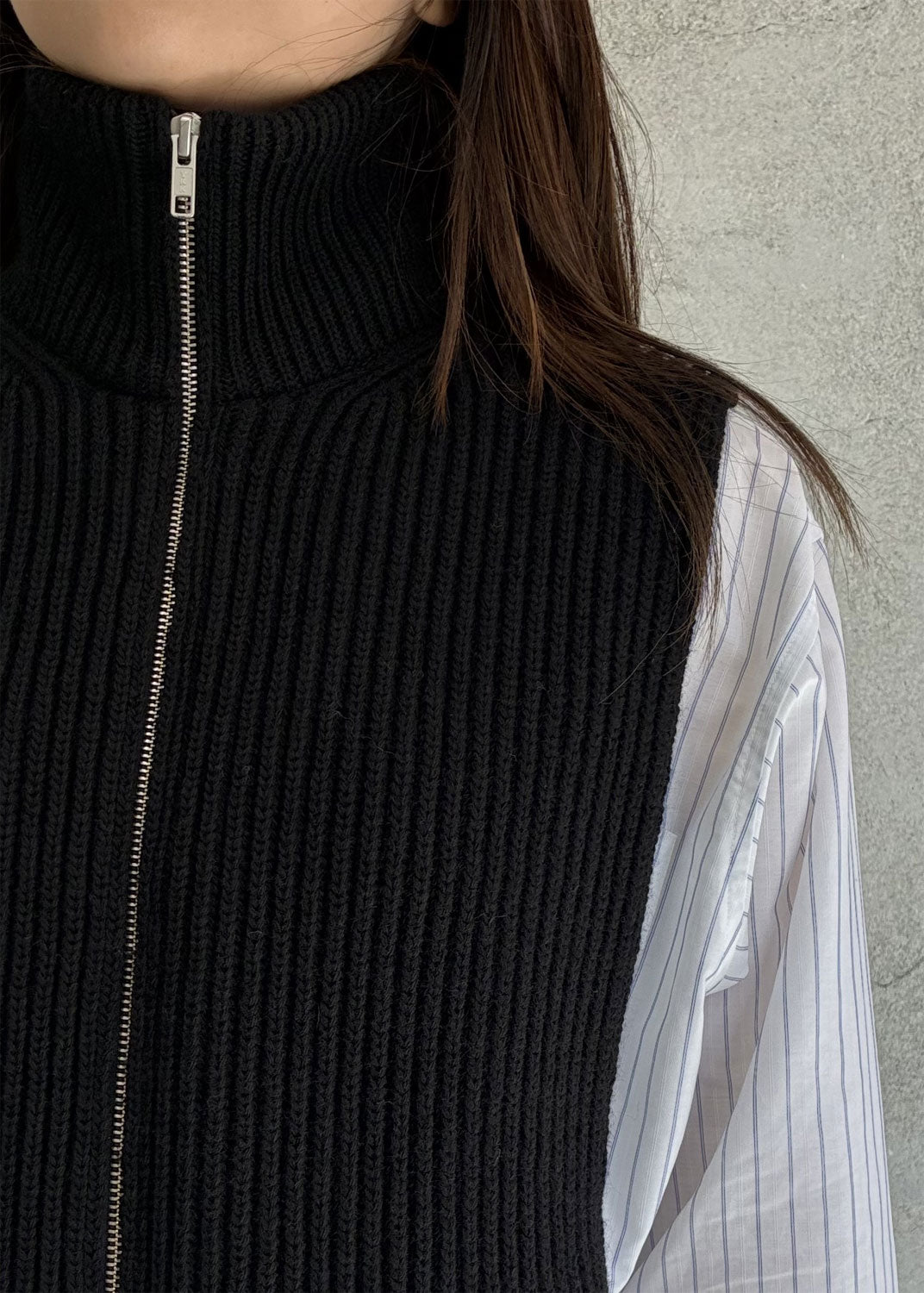 
                  
                    Zip-up knit vest
                  
                