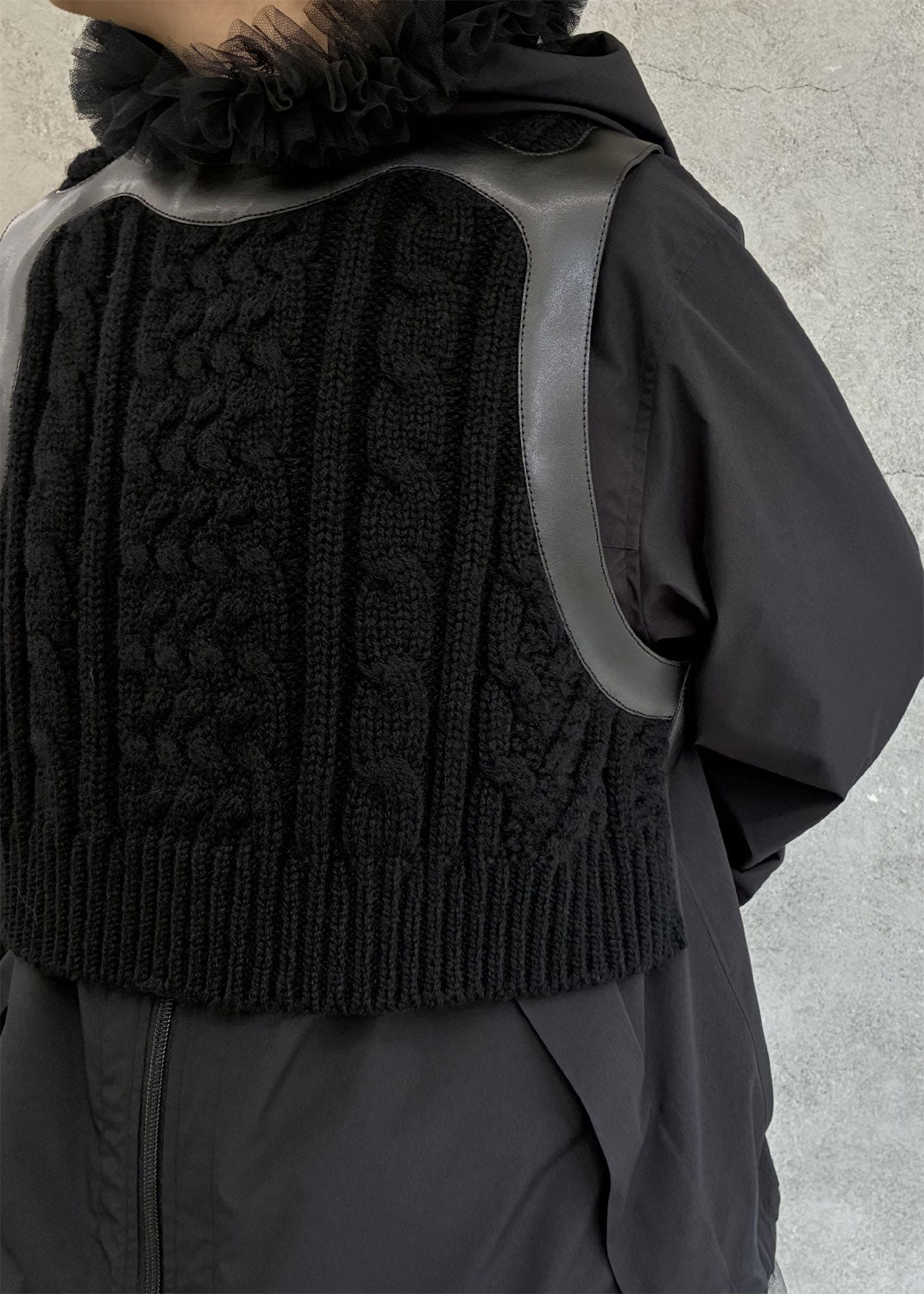
                  
                    Leather×Knit harness vest
                  
                
