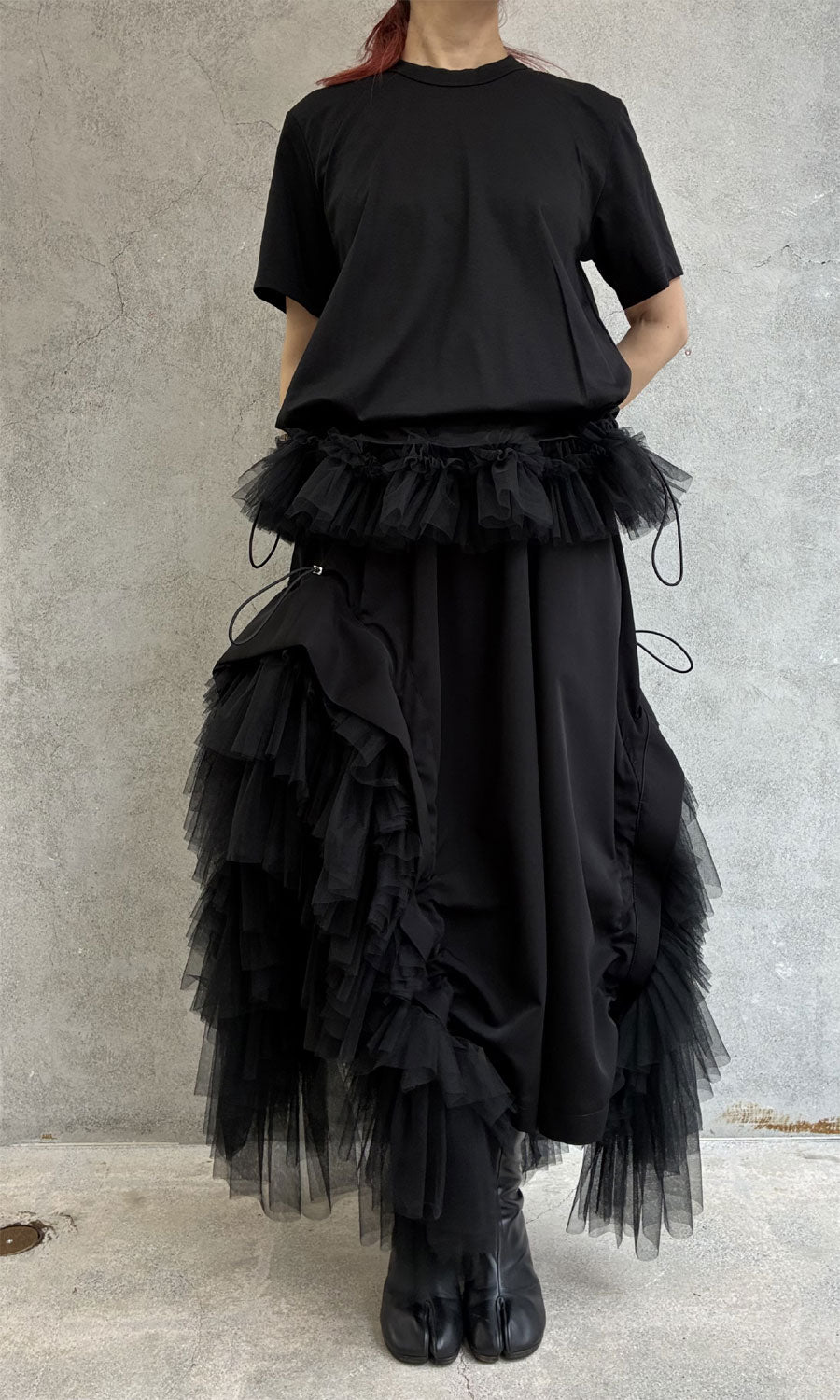 
                  
                    T-shirt with tulle hem
                  
                
