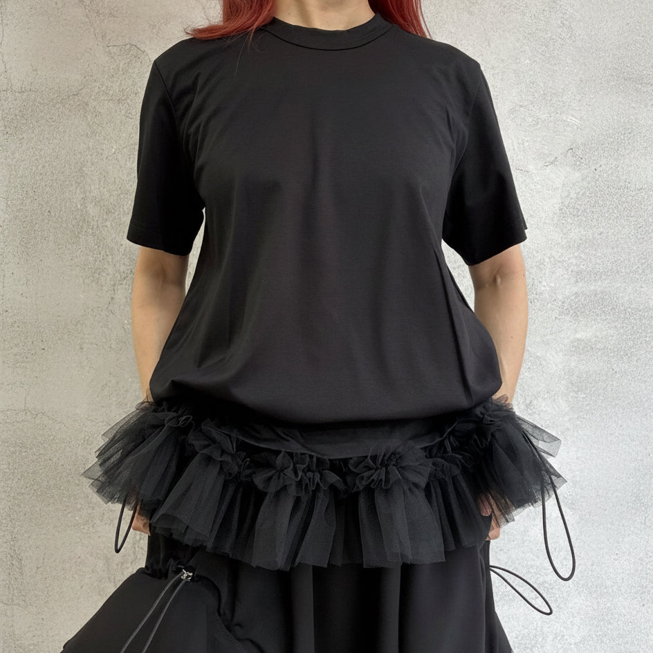 
                  
                    T-shirt with tulle hem
                  
                
