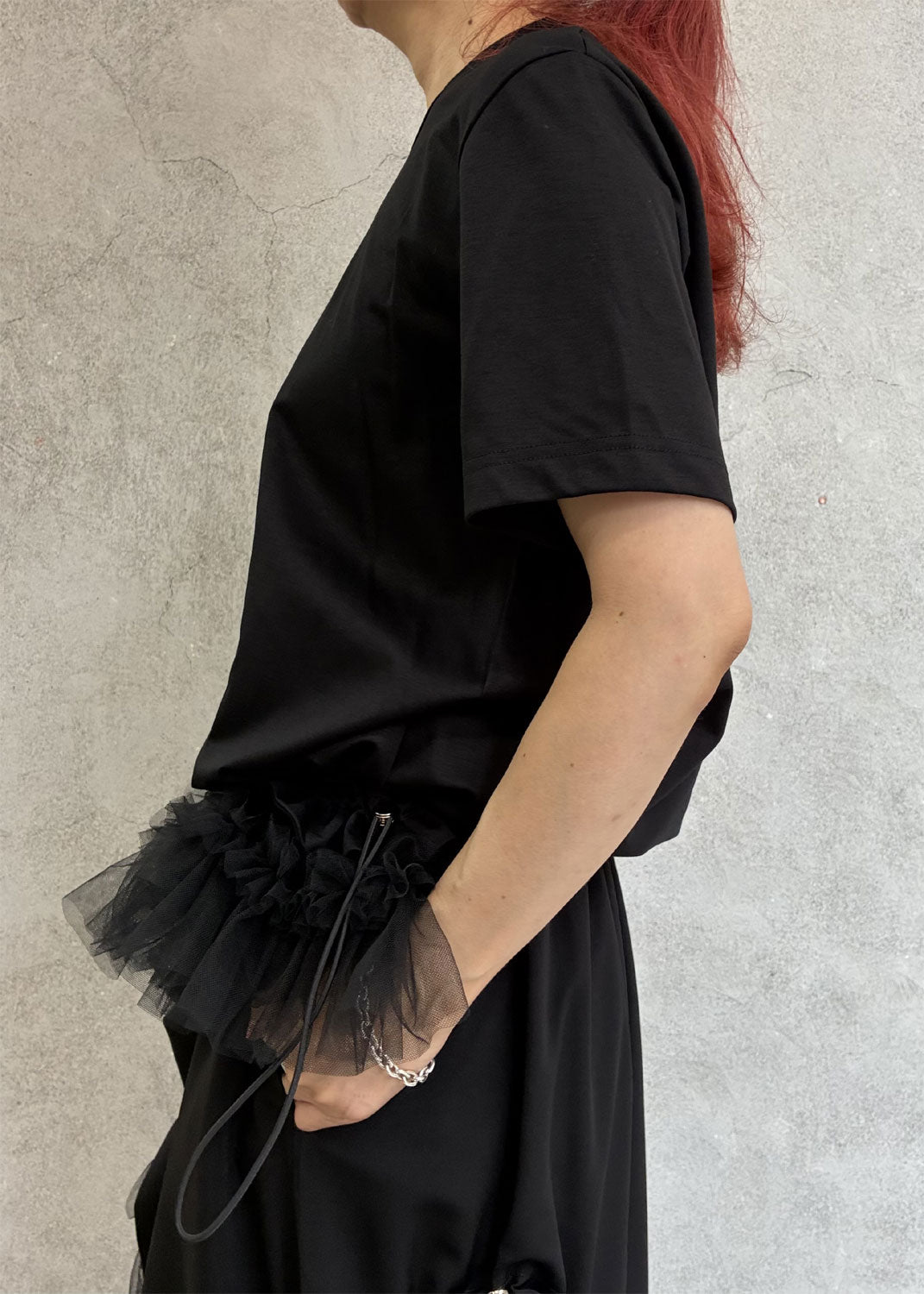 
                  
                    T-shirt with tulle hem
                  
                