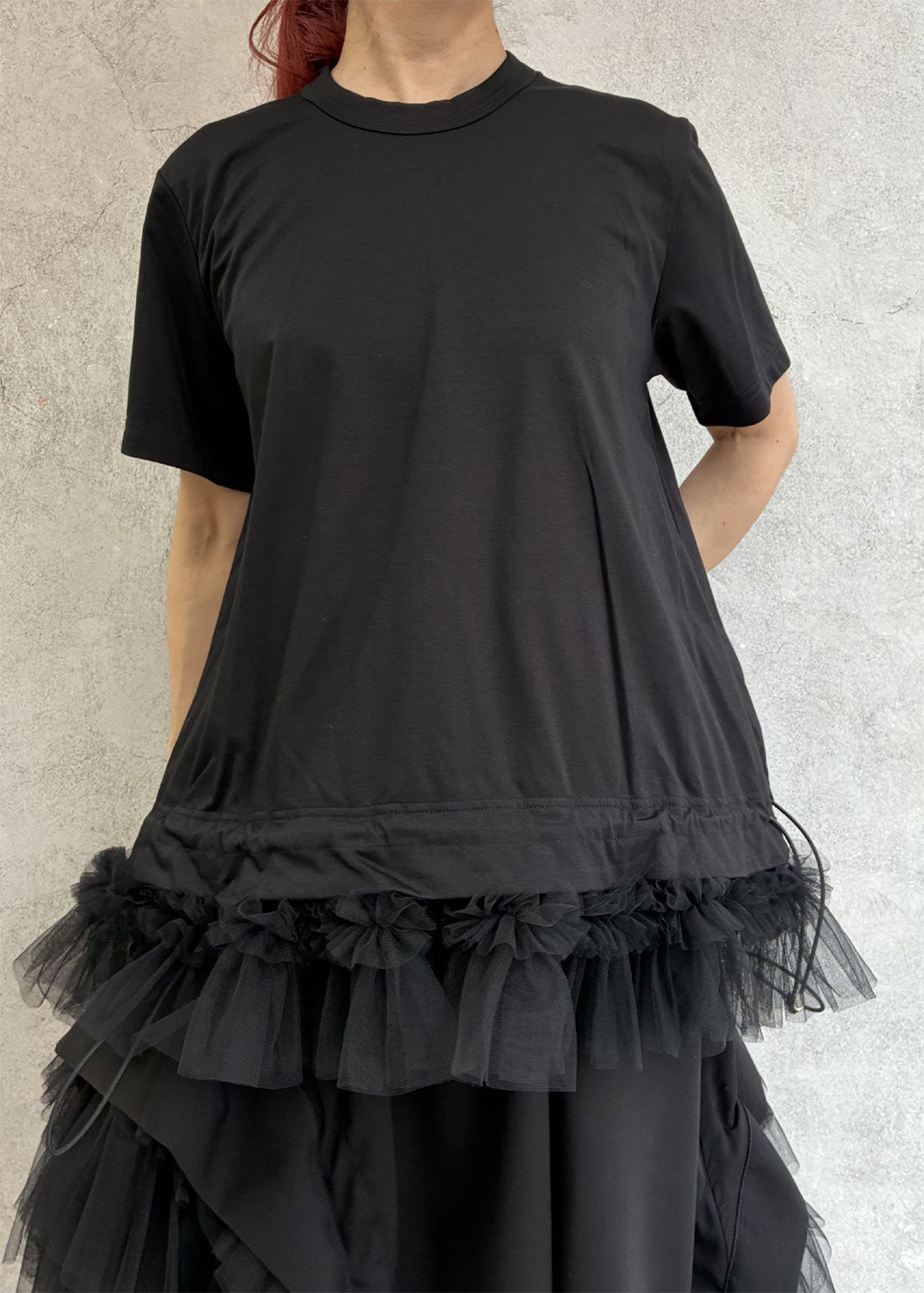 
                  
                    T-shirt with tulle hem
                  
                