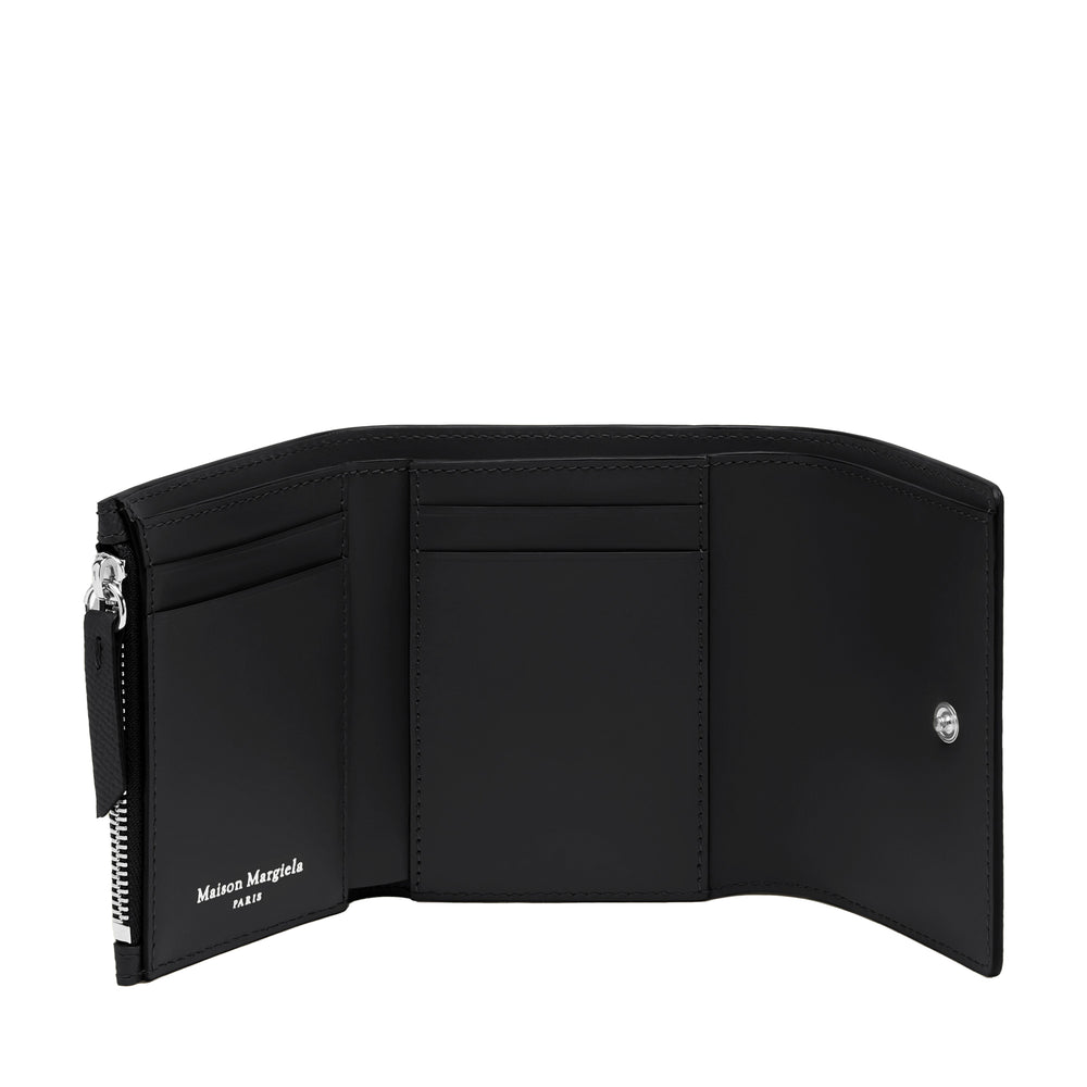 
                  
                    FOUR STITCHES WALLET
                  
                