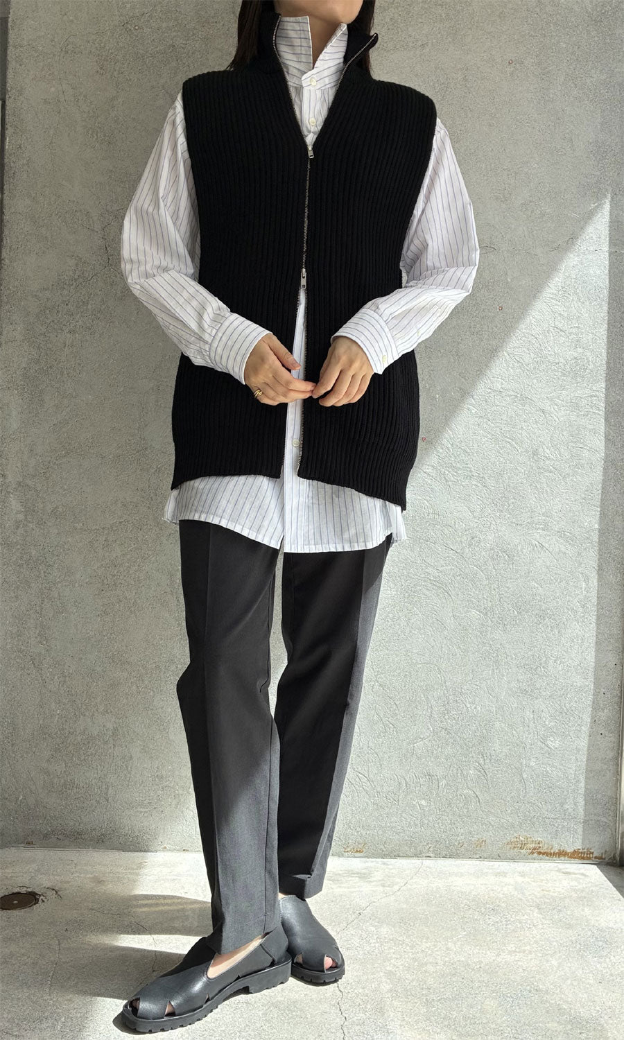 
                  
                    Zip-up knit vest
                  
                