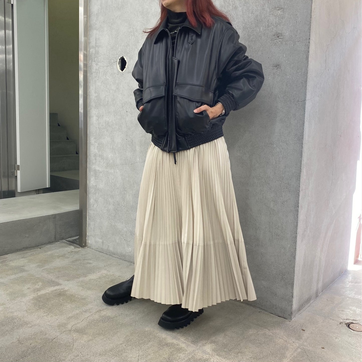 
                  
                    TAFFETA X ECO-LEATHER PLEATED SKIRT
                  
                