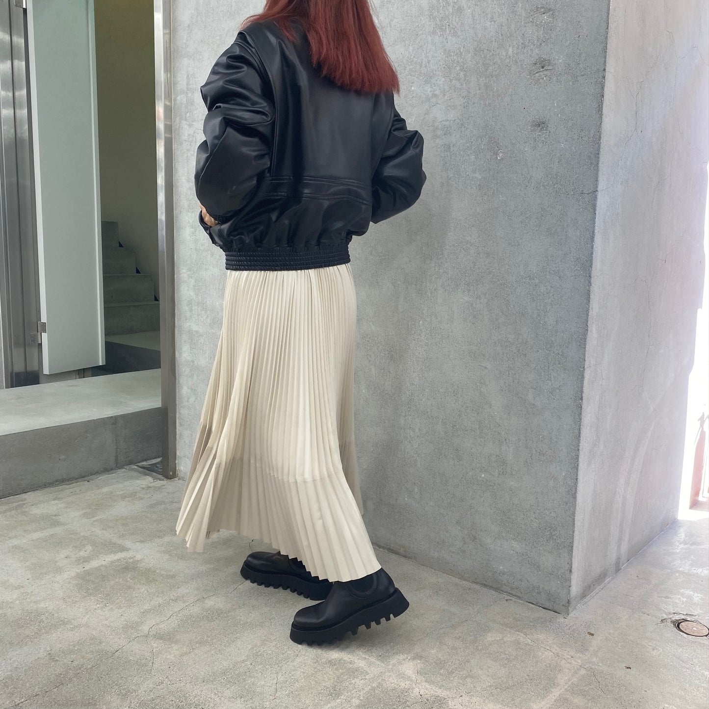 
                  
                    TAFFETA X ECO-LEATHER PLEATED SKIRT
                  
                