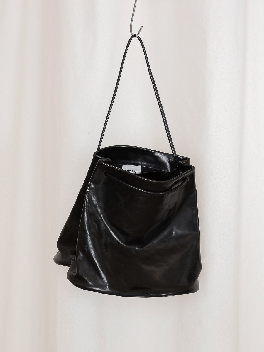 
                  
                    LEATHER HOOF BAG
                  
                