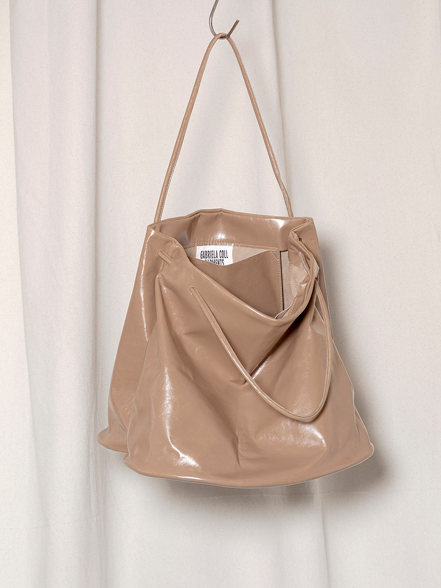 
                  
                    LEATHER HOOF BAG
                  
                