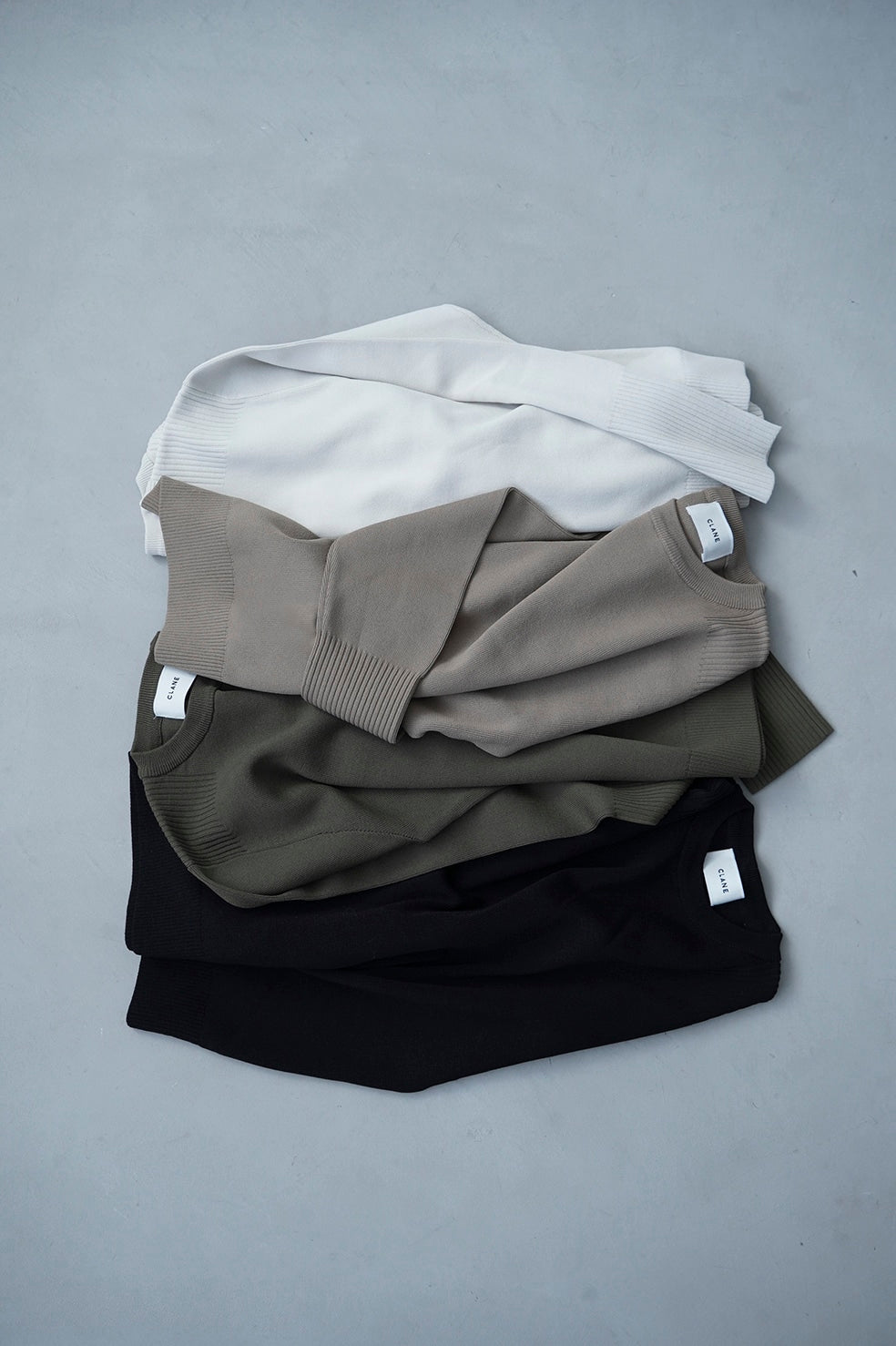 
                  
                    BASIC COMPACT KNIT TOPS
                  
                