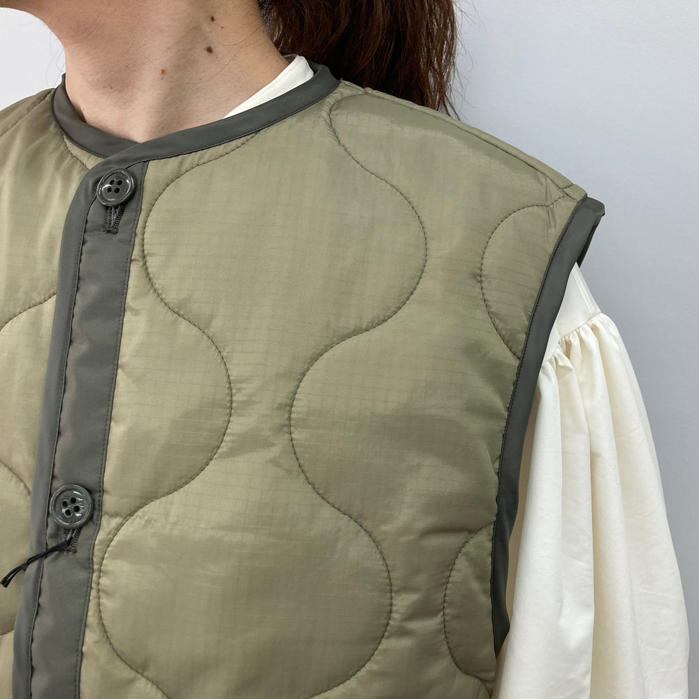 
                  
                    QUILTED CROPPED VEST
                  
                