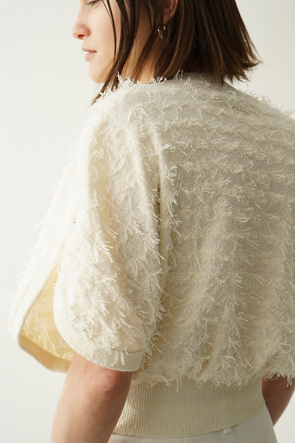 
                  
                    FRINGE ARCH SLEEVE KNIT TOPS
                  
                